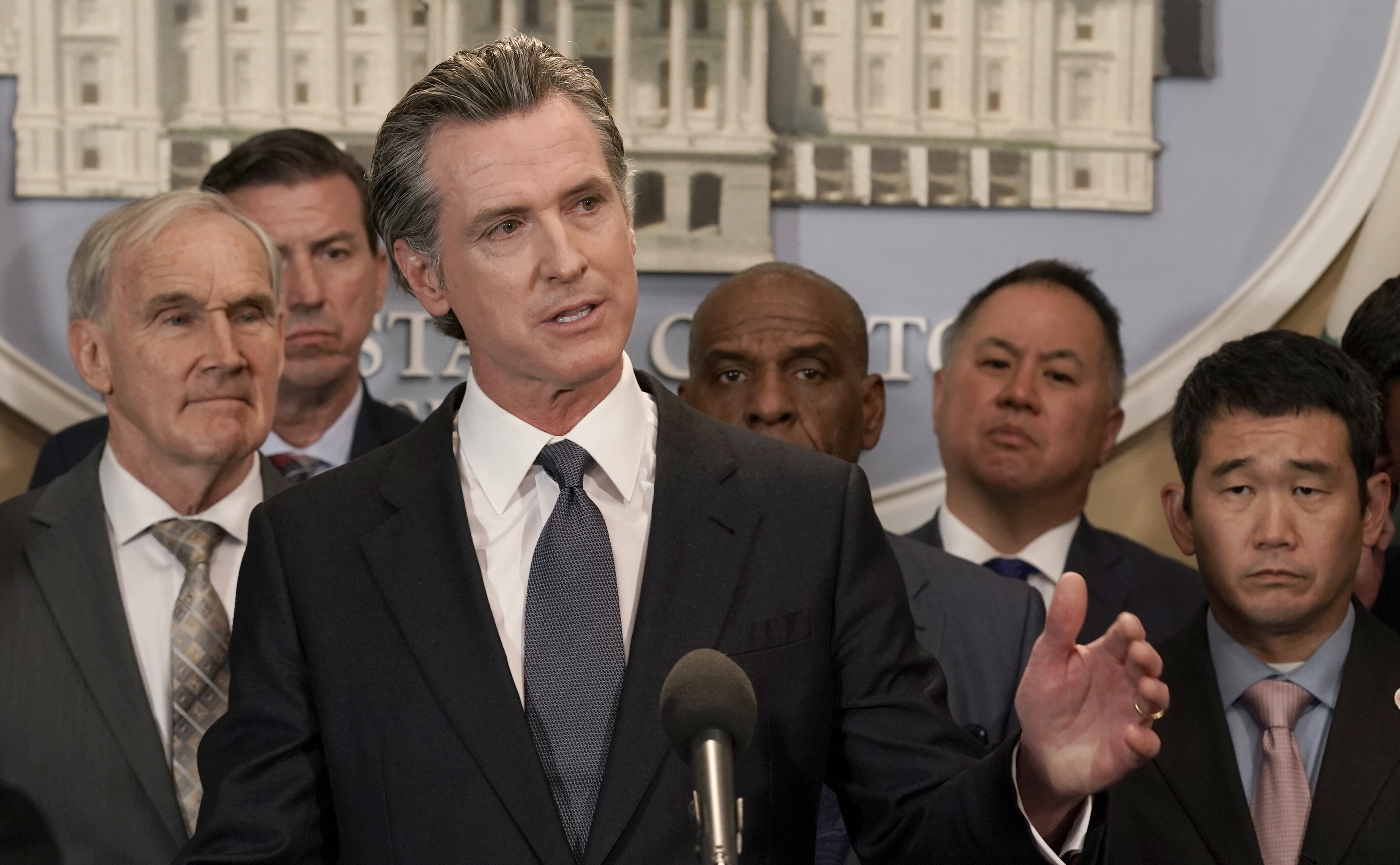 California Gov. Gavin Newsom, pictured here in Sacramento on May 25, signed a law that clears the path for gun violence victims to file civil suits against the companies that manufacture the firearms used in crimes.