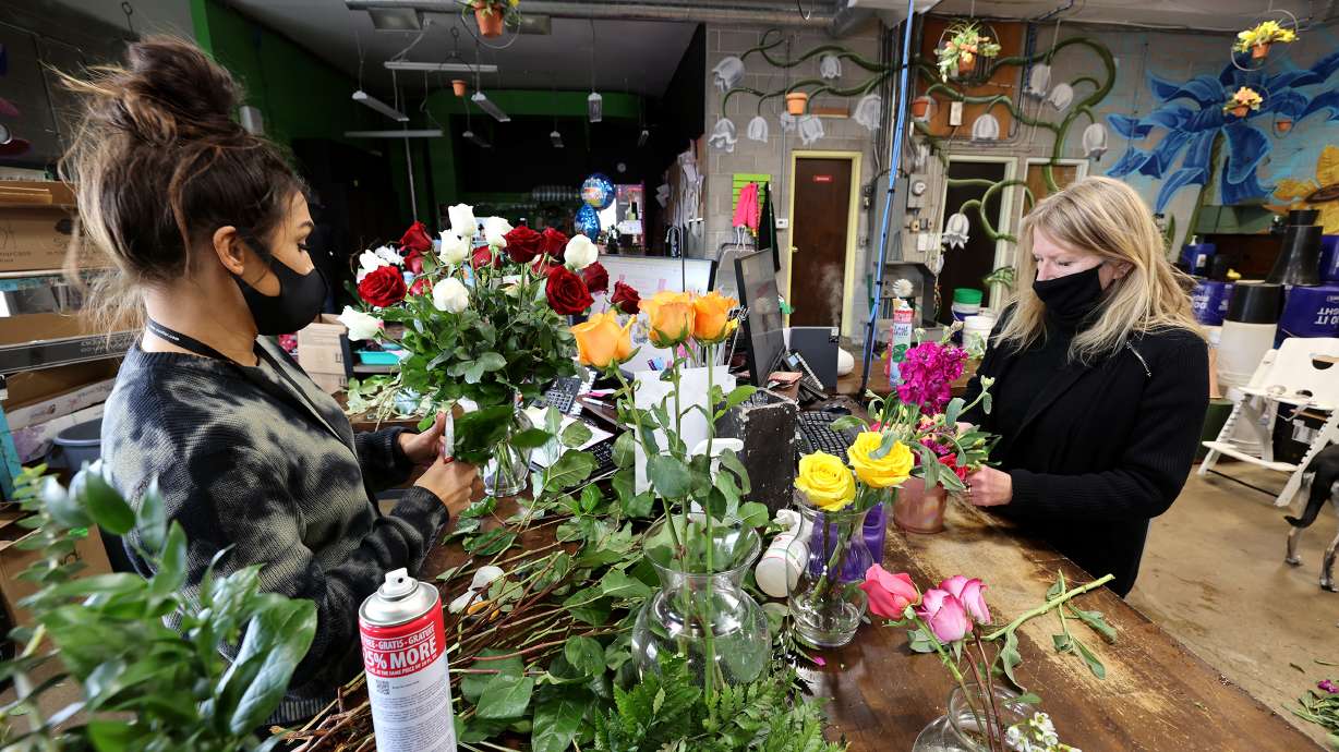 Natalie Rasmussen, left, and her mother-in-law, Marci Rasmussen, owner of Especially For You Your Downtown Florist, create floral arrangements at the shop in Salt Lake City on Jan. 12, 2021.