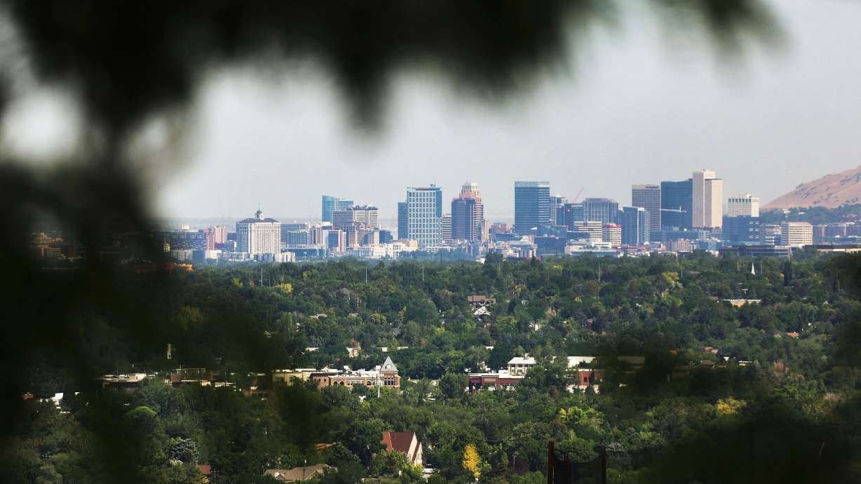 The Salt Lake City skyline and valley homes in Salt Lake County on Wednesday. The world’s population is expected to reach 8 billion this fall.