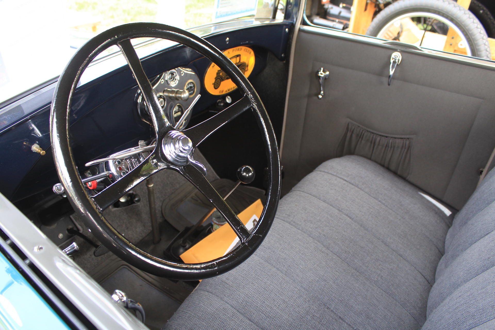 The interior of Bill Thompson's 1929 Ford Model A Special Coupe is shown at the 2022 Rat Fink Reunion Car Show in Manti. Seating for two; seat belts for none.