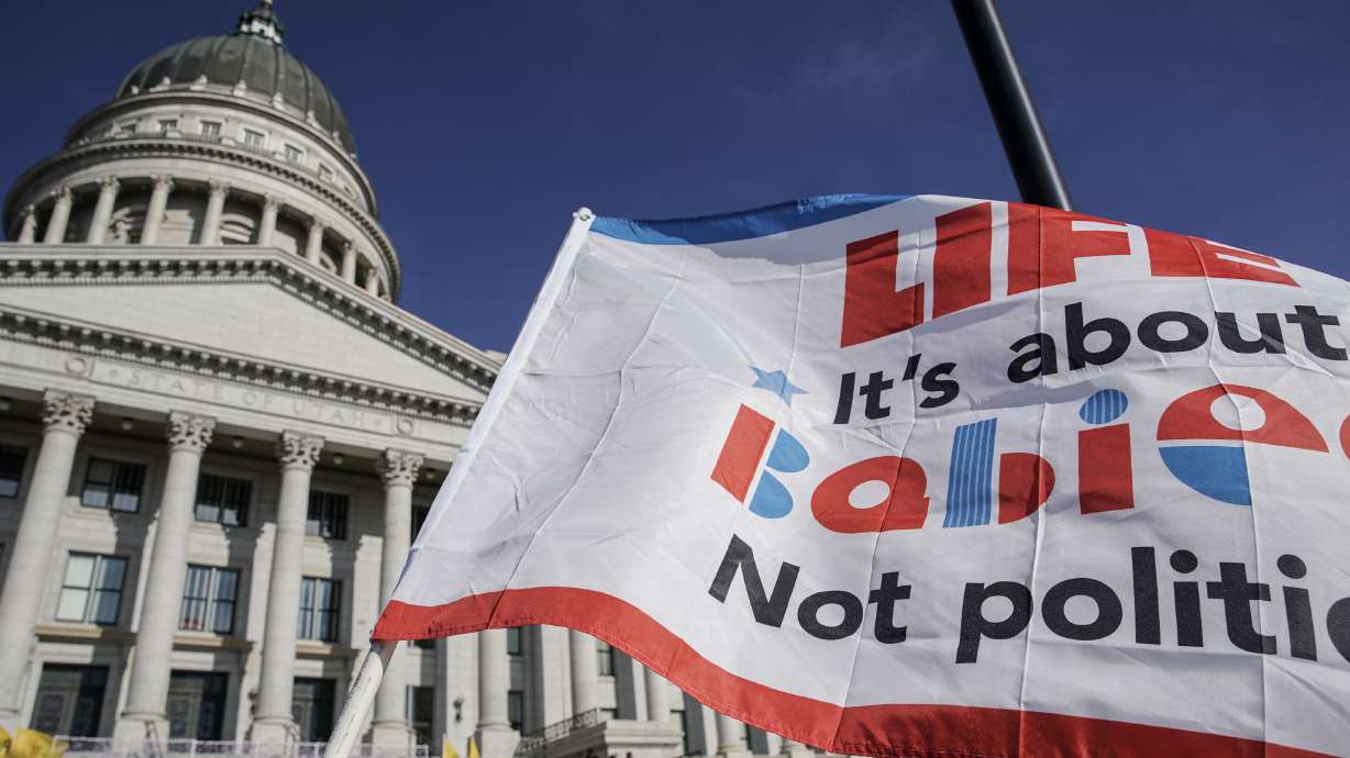 An anti-abortion flag is pictured during the annual March for Life in Salt Lake City on Jan. 22, 2022. The Utah Supreme Court will hear arguments this week in a lawsuit challenging the state's near-total abortion ban.
