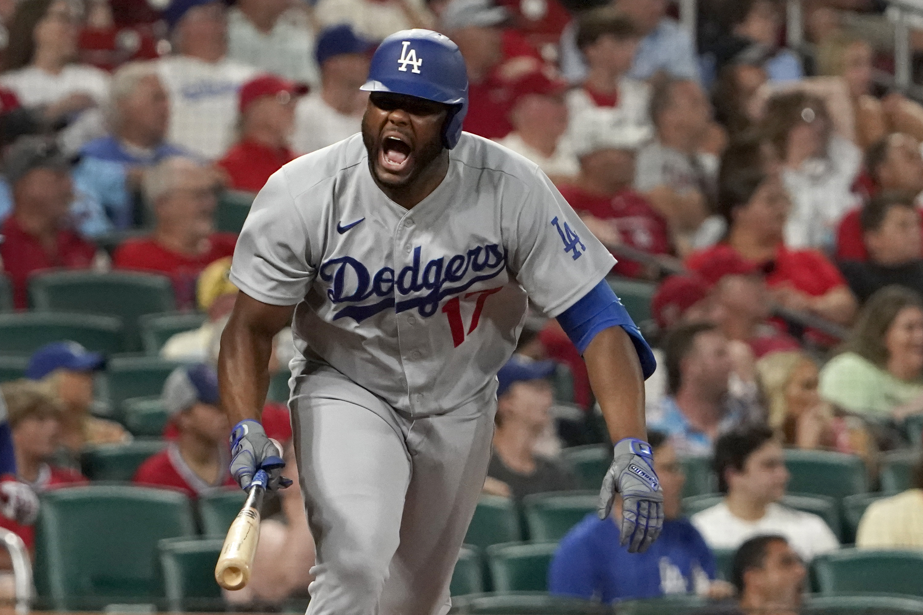 Los Angeles Dodgers' Hanser Alberto celebrates after hitting an RBI single during the ninth inning of a baseball game against the St. Louis Cardinals Wednesday, July 13, 2022, in St. Louis.