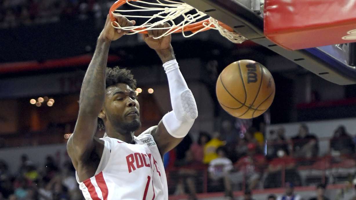 Houston Rockets' Tari Eason dunks against the Oklahoma City Thunder during the first half of an NBA summer league basketball game Saturday, July 9, 2022, in Las Vegas.