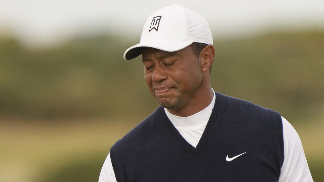 Tiger Woods of the US after putting on the 11th green during the first round of the British Open golf championship on the Old Course at St. Andrews, Scotland, Thursday July 14, 2022. The Open Championship returns to the home of golf on July 14-17, 2022, to celebrate the 150th edition of the sport's oldest championship, which dates to 1860 and was first played at St. Andrews in 1873.