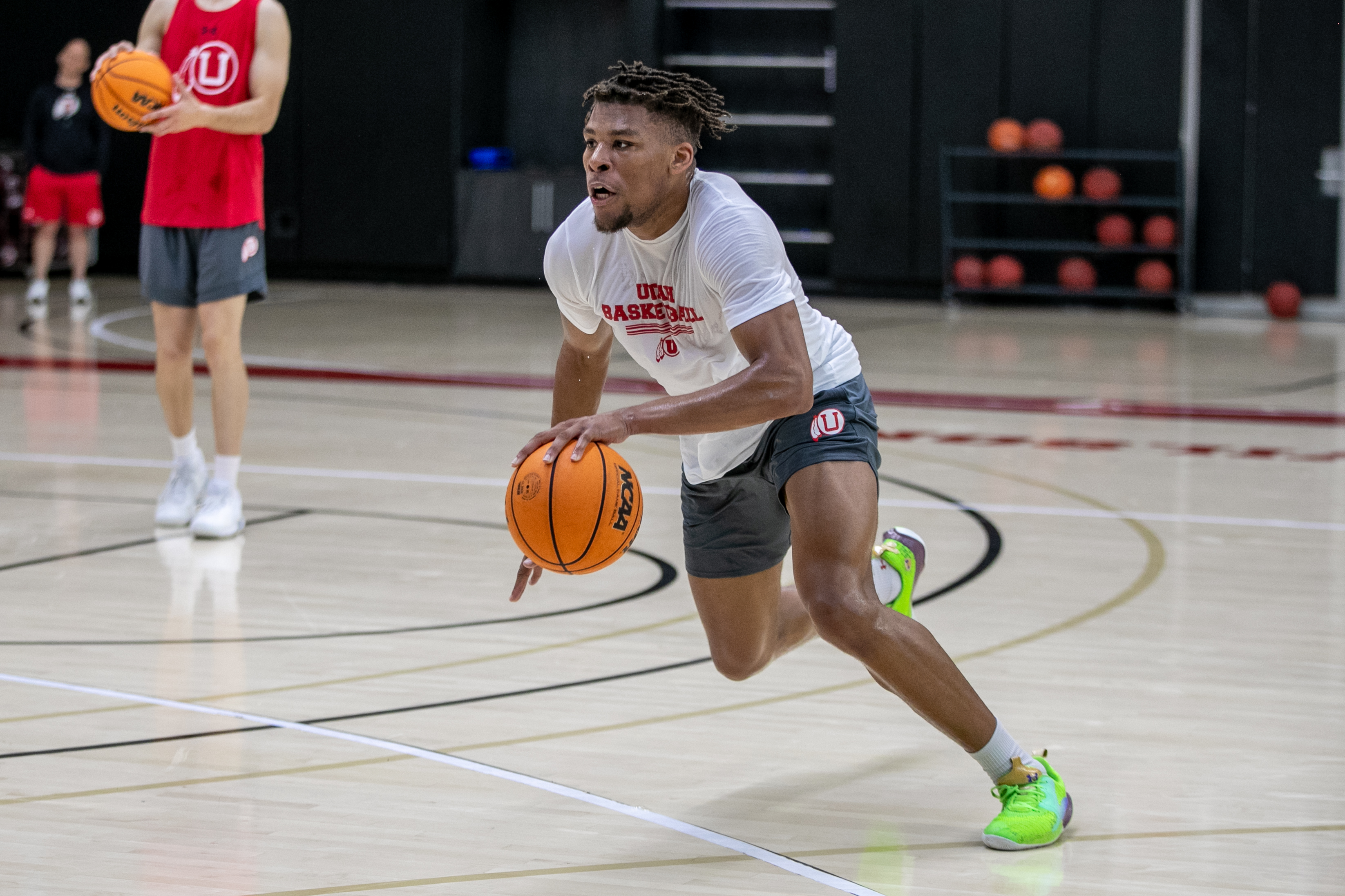 Freshman Wilguens Exacte Jr. works on drills during a summer practice session at the University of Utah.