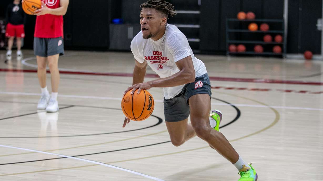 Freshman Wilguens Exacte Jr. works on drills during a summer practice session at the University of Utah.