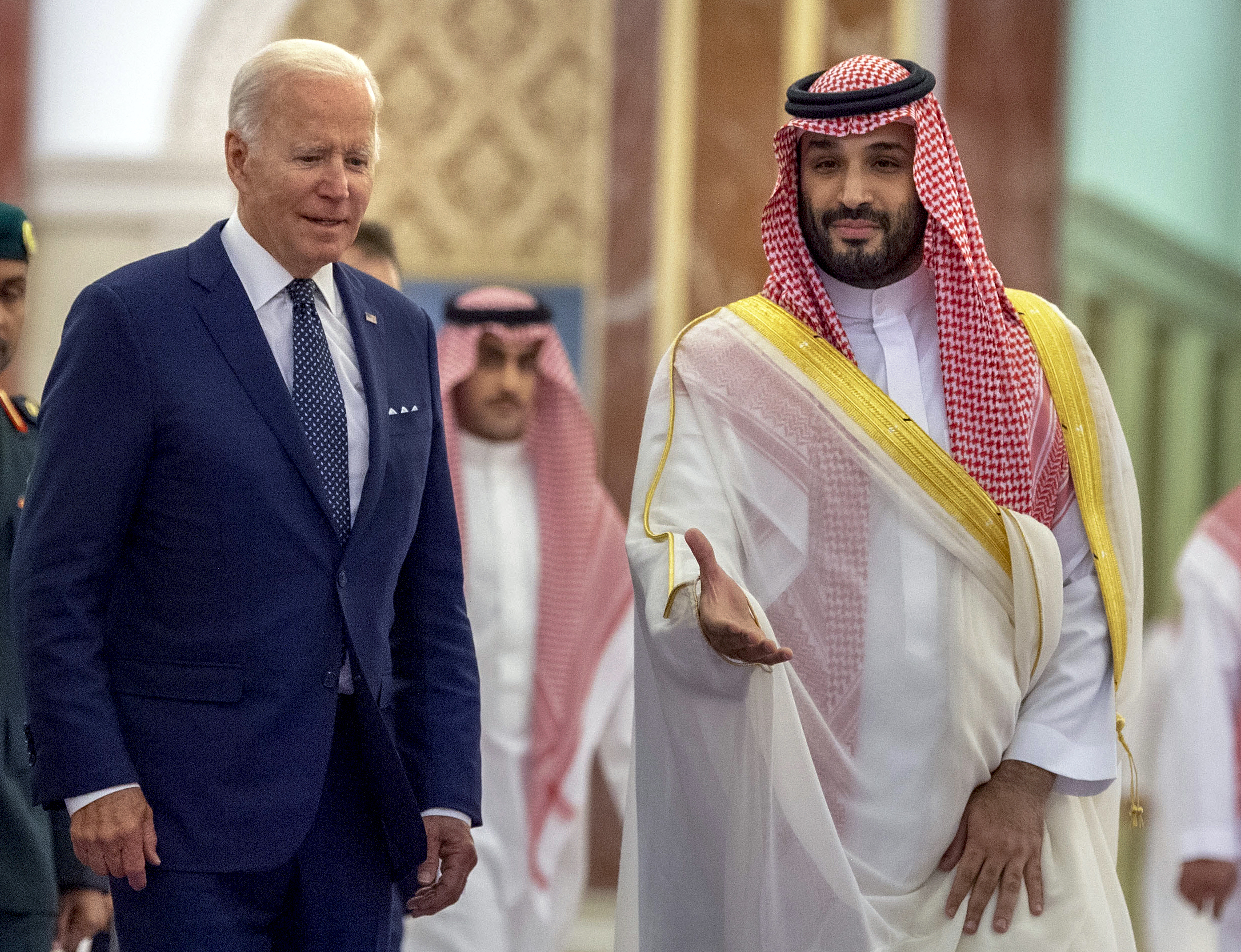Saudi Crown Prince Mohammed bin Salman, right, welcomes President Joe Biden upon his arrival at Al-Salam palace in Jeddah, Saudi Arabia, Friday.