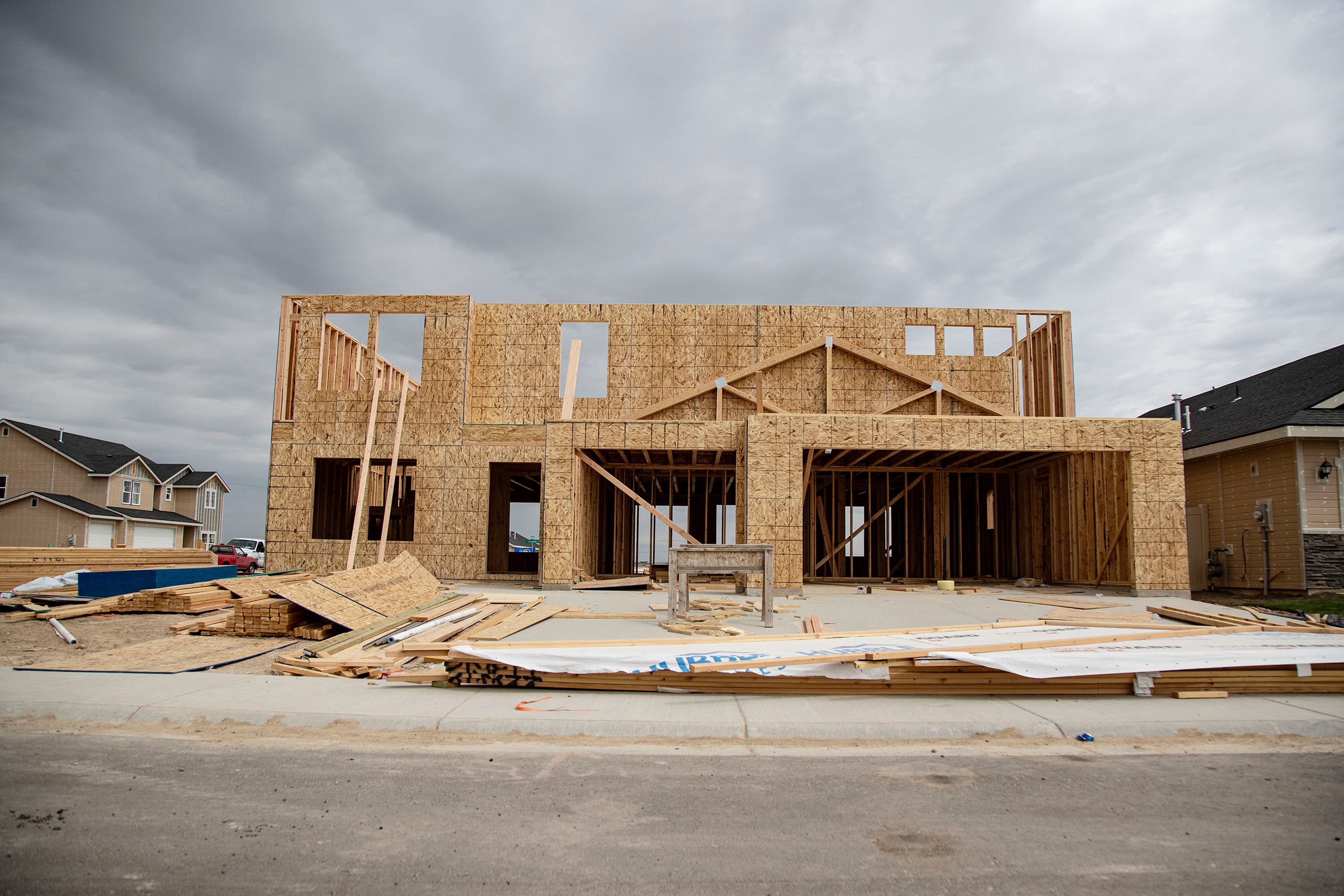 A house that is under construction by Hubble Homes in a new subdivision called Franklin Village in Nampa, Idaho, is pictured on May 19, 2021. A city in the West has seen the nation's largest share of home sellers cutting their asking prices.