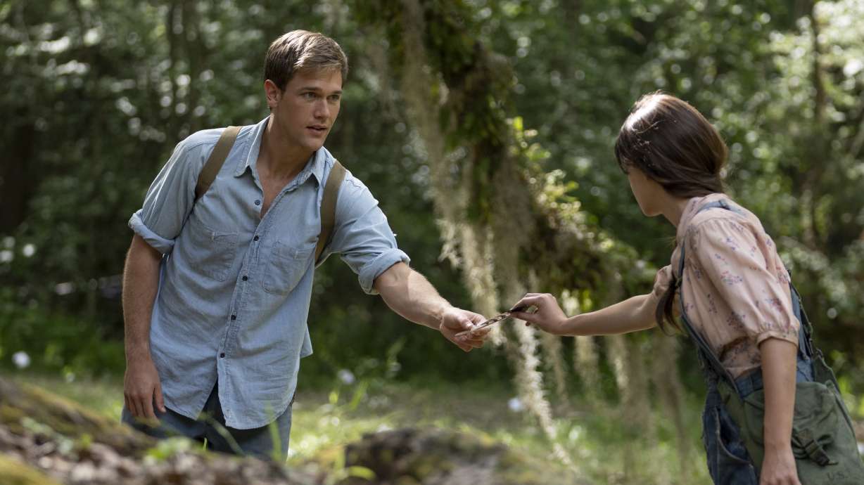 This image released by Sony Pictures shows Taylor John Smith, left, and Daisy Edgar-Jones in a scene from "Where the Crawdads Sing."