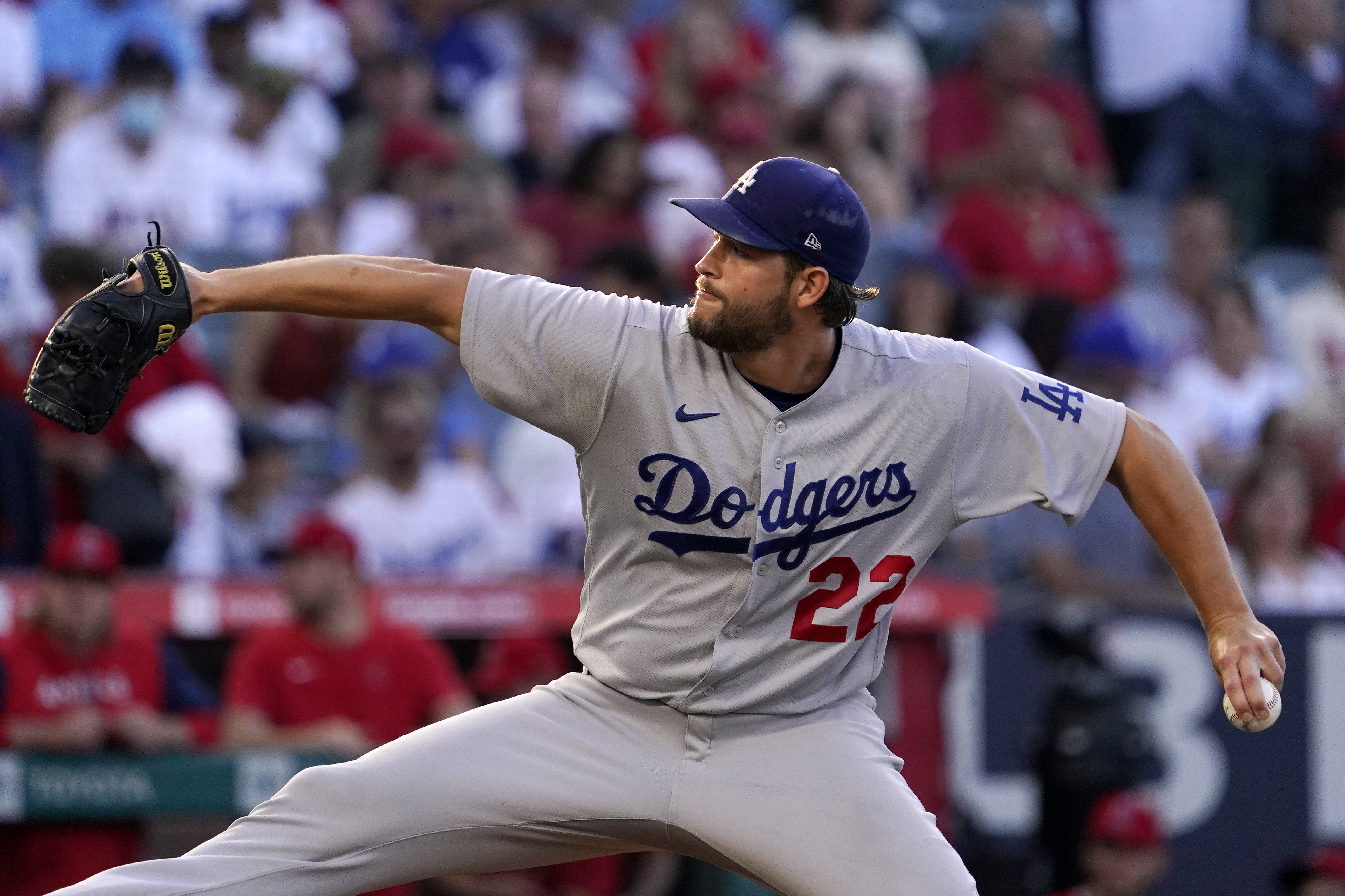 Los Angeles Dodgers starting pitcher Clayton Kershaw throws to the plate during the second inning of a baseball game against the Los Angeles Angels Friday, July 15, 2022, in Anaheim, Calif.