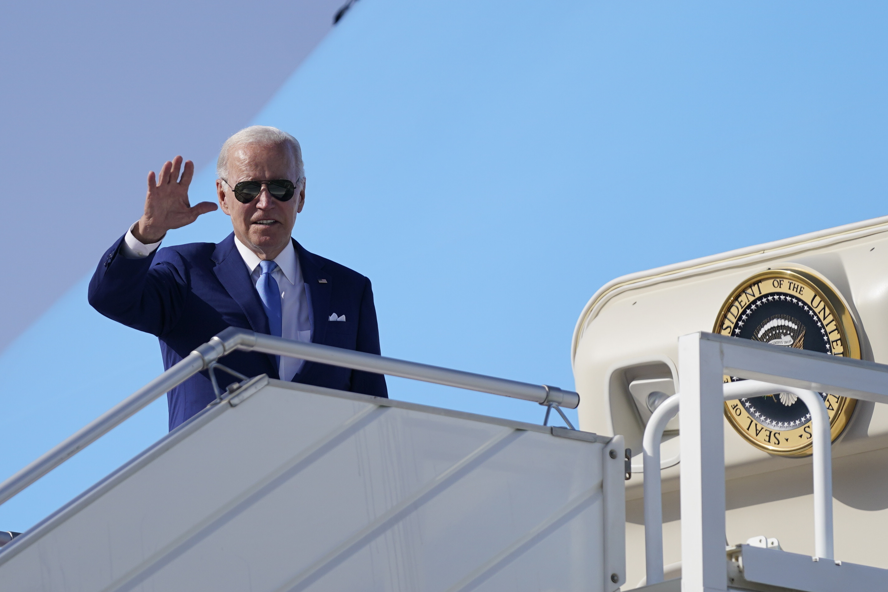 President Joe Biden waves before departure, Saturday in Jeddah, Saudi Arabia.