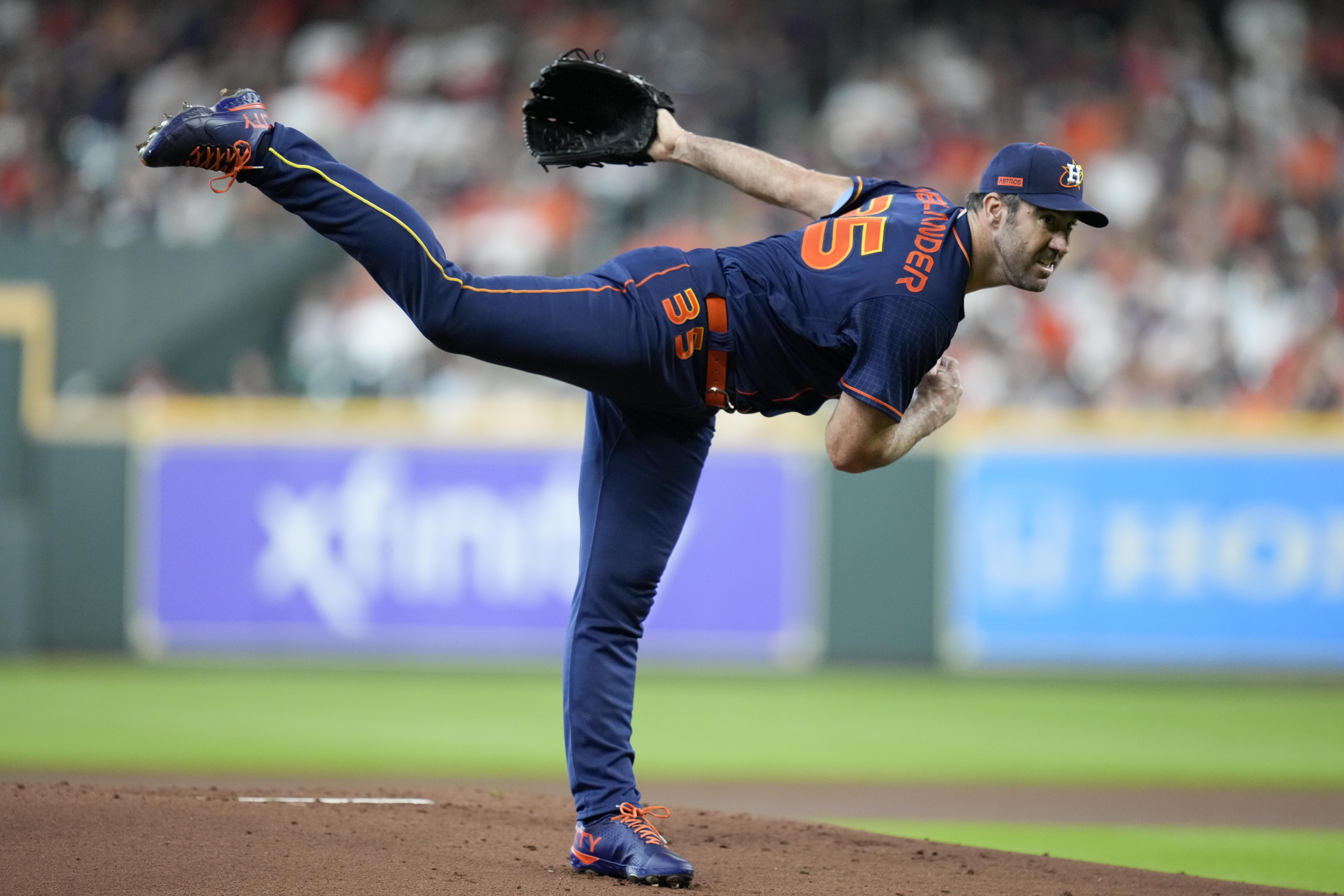 Houston Astros starting pitcher Justin Verlander follows through on a pitch during the first inning of a baseball game against the Oakland Athletics, Saturday, July 16, 2022, in Houston. 
