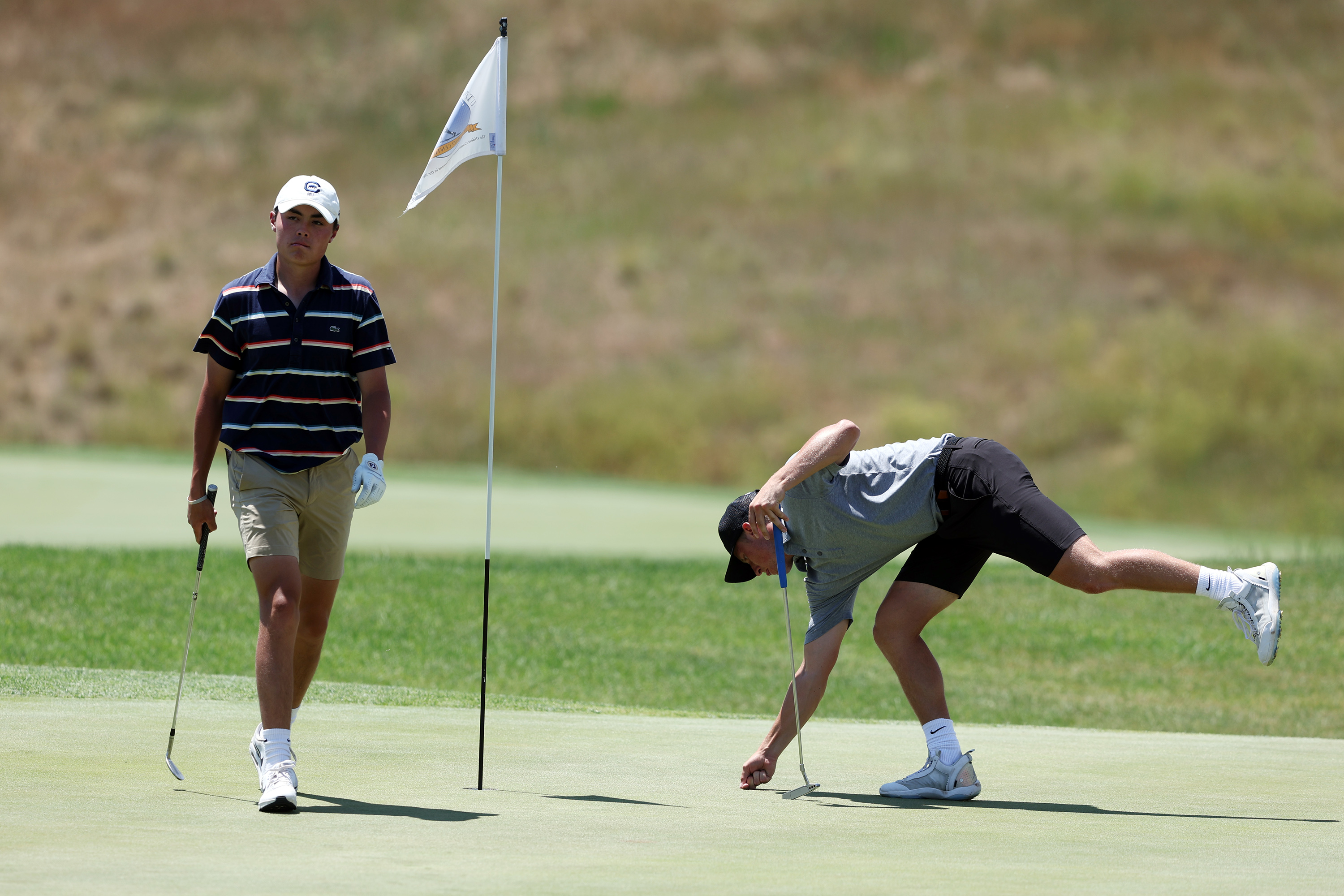 Simon Kwon and Zac Jones work on a green as they play in Match play for the 124th Utah State Amateur Championship at Soldier Hollow Golf Course in Midway on Saturday, July 16, 2022. Jones won 4 and 3.