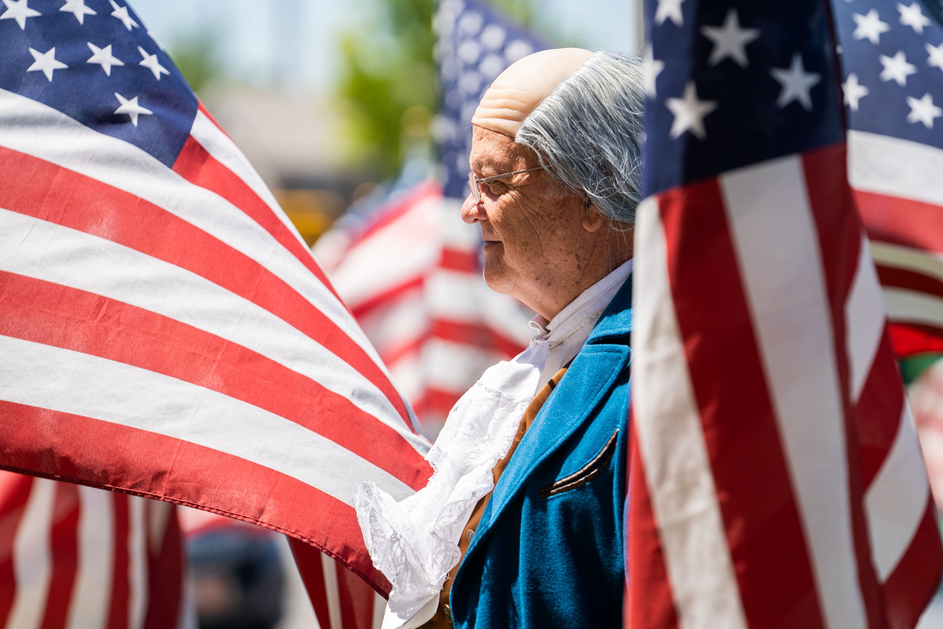 Gregory C. Duerden, of the Independent American Party and who is dressed as Benjamin Franklin for the “Cries of Freedom” event, stands outside of the SECRA Center of the Arts in Orem on July 4. The Independent American Party of Utah has seen steady growth over the last few years as more voters have registered with the conservative party. 