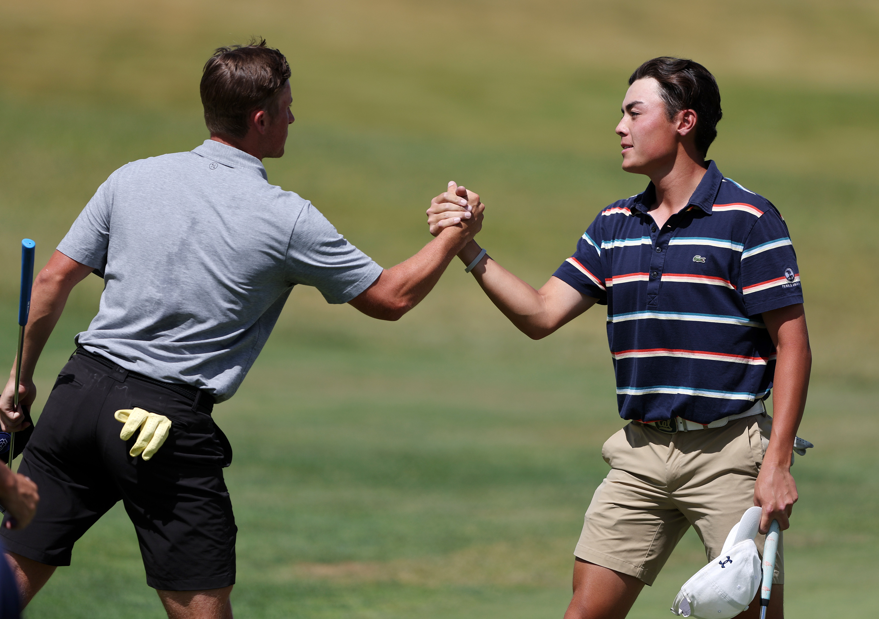 Zac Jones and Simon Kwon shake hands at the end of their Match play for the 124th Utah State Amateur Championship at Soldier Hollow Golf Course in Midway on Saturday, July 16, 2022. Jones won 4 and 3.