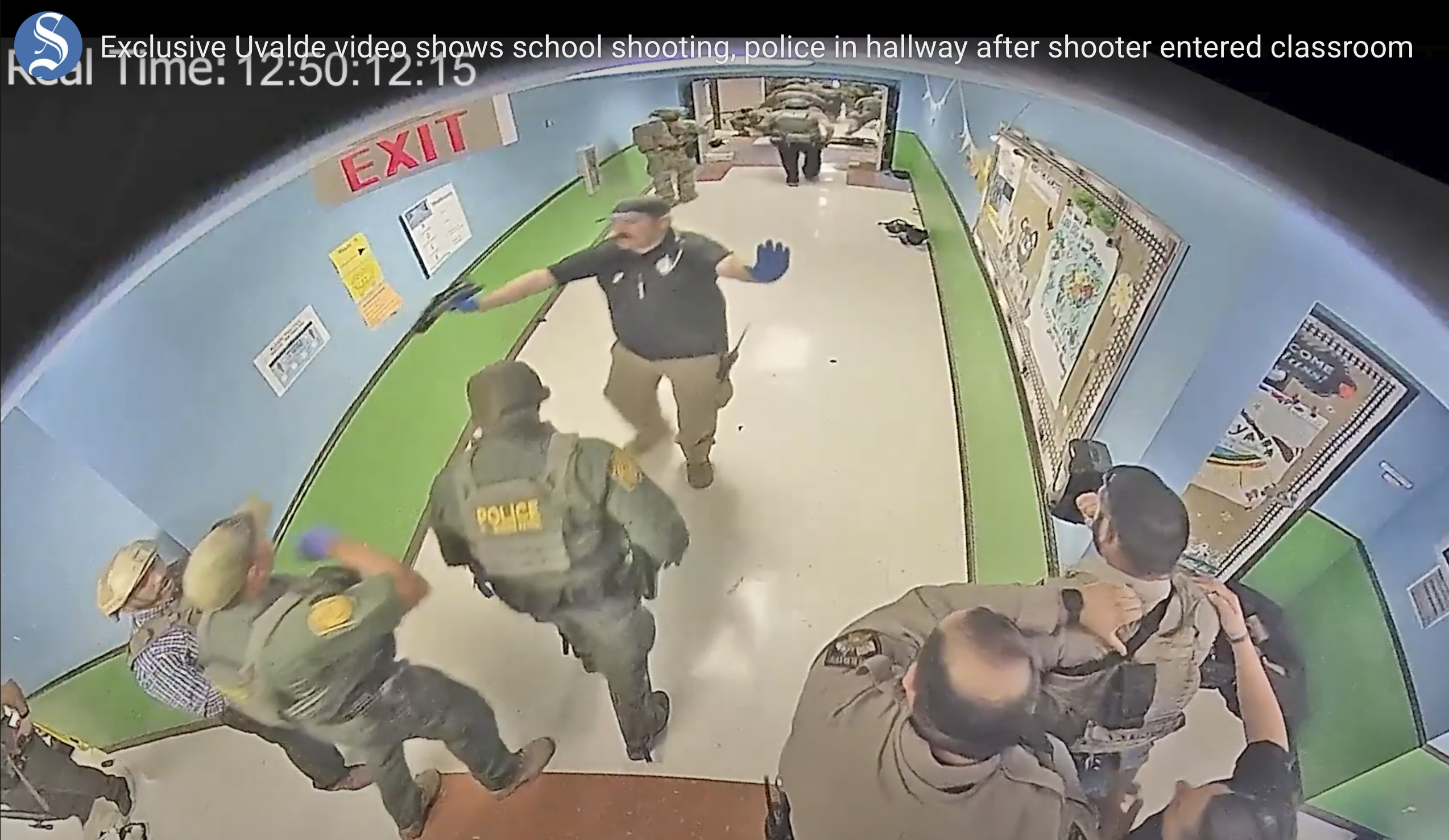 In this photo from surveillance video provided by the Uvalde Consolidated Independent School District via the Austin American-Statesman, authorities respond to the shooting at Robb Elementary School in Uvalde, Texas, on May 24. Nearly 400 law enforcement officials rushed to the mass shooting that left 21 people dead.