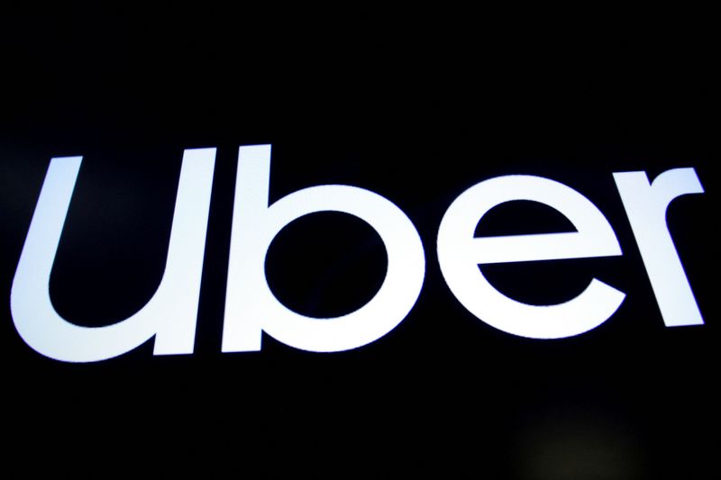 A screen displays the company logo for Uber Technologies on the day of its IPO at the New York Stock Exchange in New York, May 10, 2019.