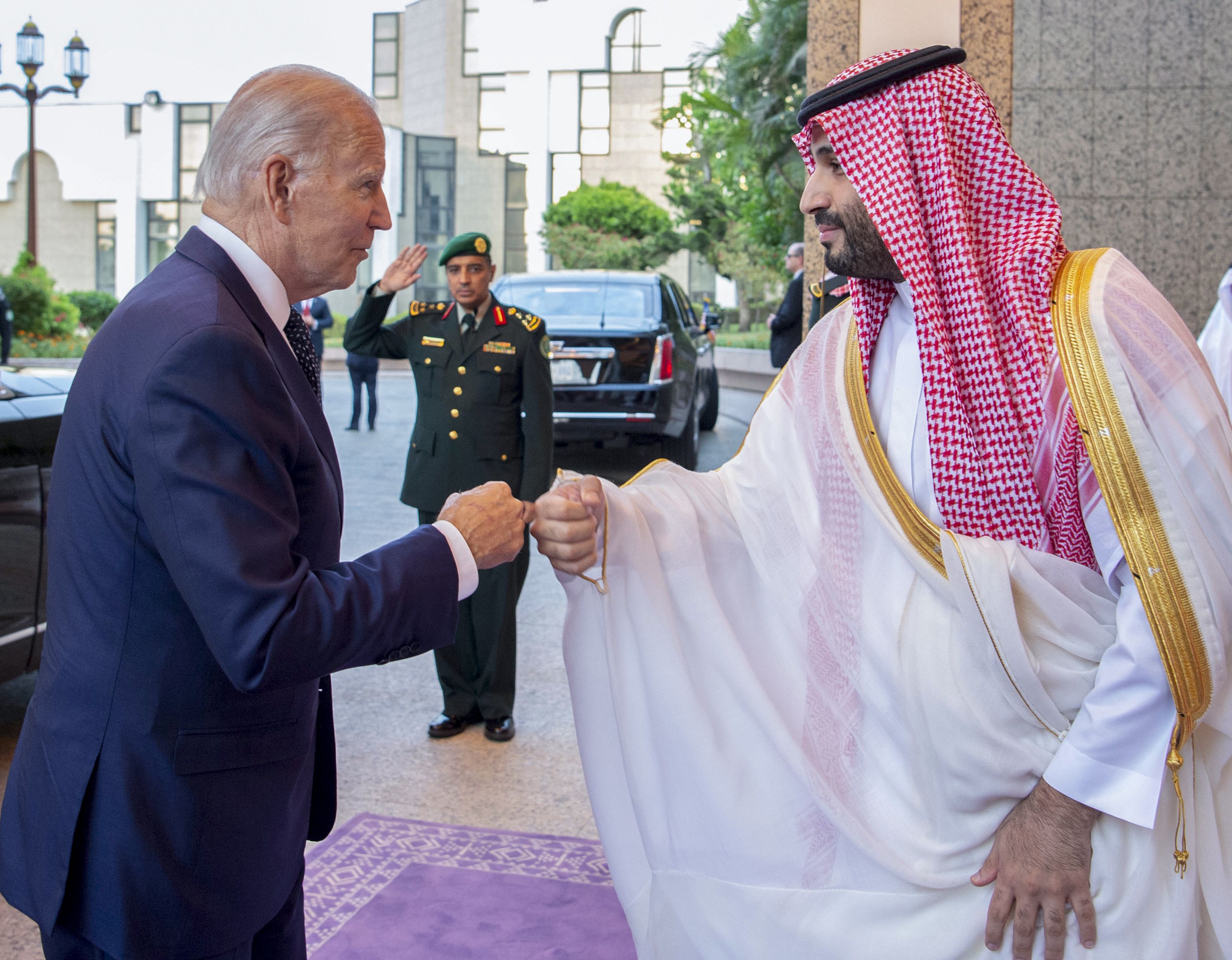 In this image released by the Saudi Royal Palace, Saudi Crown Prince Mohammed bin Salman, right, greets President Joe Biden with a fist bump after his arrival at Al-Salam palace in Jeddah, Saudi Arabia, Friday.