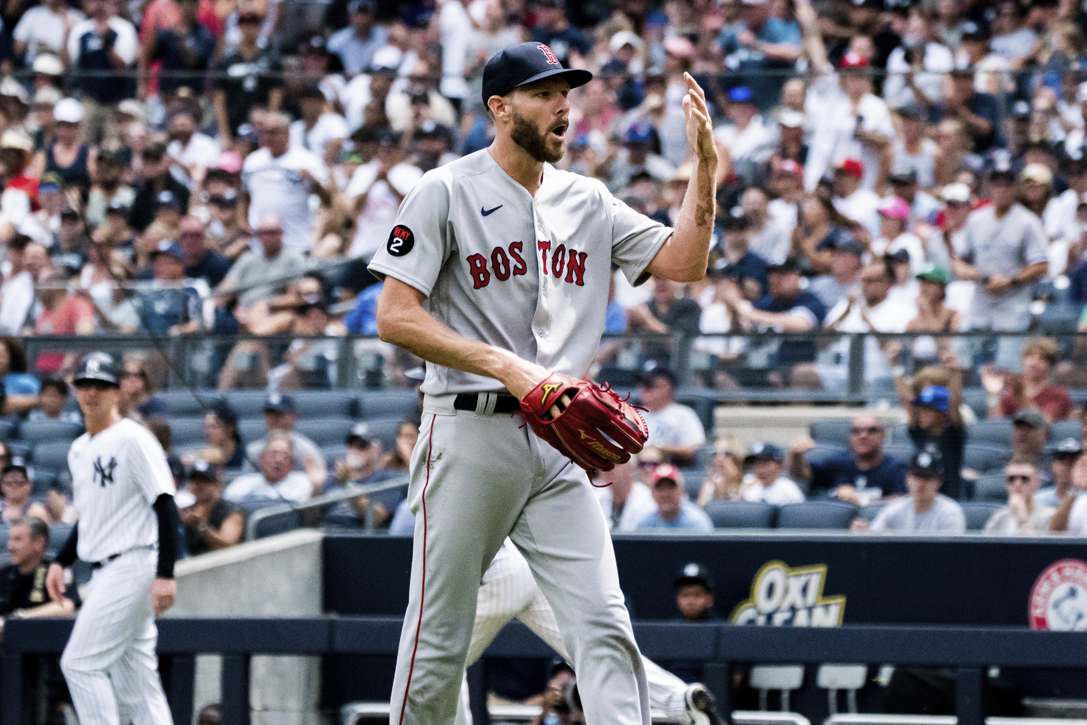 Boston Red Sox starting pitcher Chris Sale walks off the mound after a hand injury during the second inning of a baseball game against the New York Yankees, Sunday, July 17, 2022, in New York. 