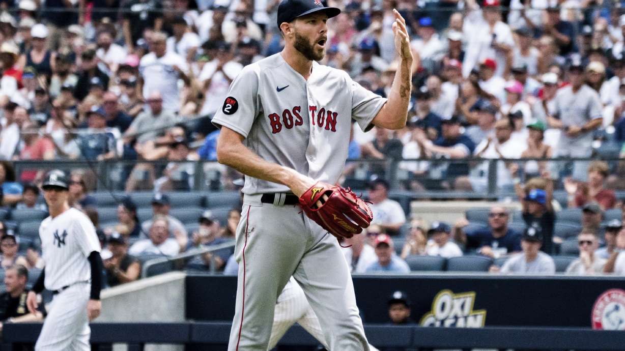 Boston Red Sox starting pitcher Chris Sale walks off the mound after a hand injury during the second inning of a baseball game against the New York Yankees, Sunday, July 17, 2022, in New York.