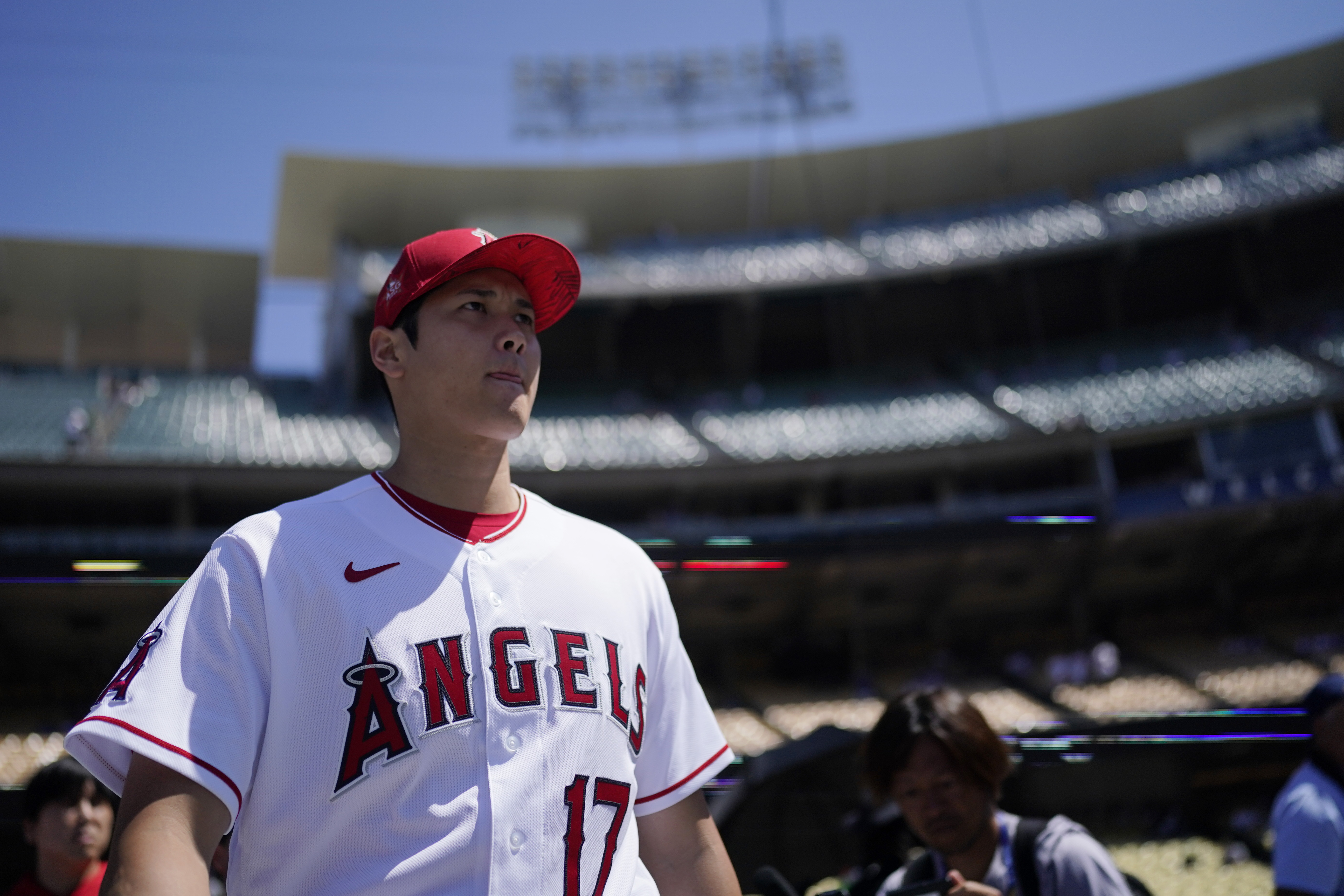 Los Angeles Angels' Shohei Ohtani enters the field during batting practice a day before the 2022 MLB All-Star baseball game, Monday, July 18, 2022, in Los Angeles. 