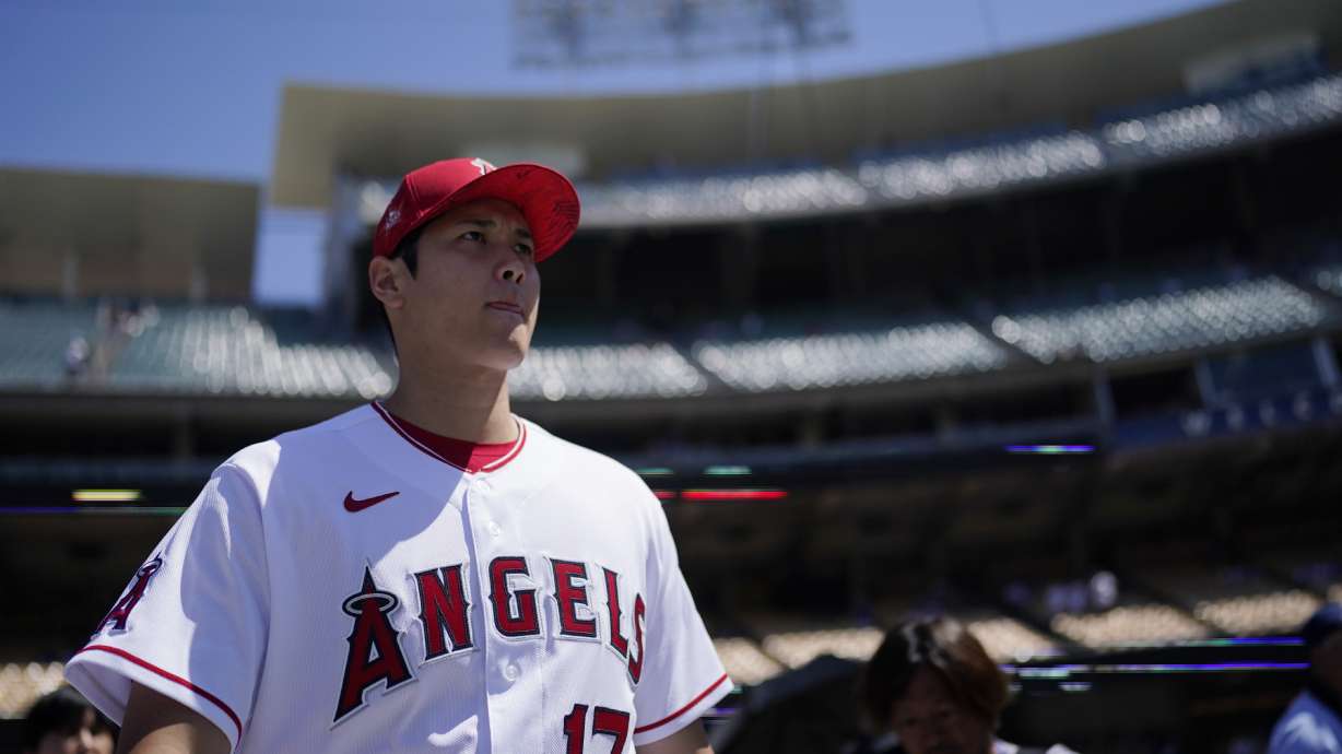 Los Angeles Angels' Shohei Ohtani enters the field during batting practice a day before the 2022 MLB All-Star baseball game, Monday, July 18, 2022, in Los Angeles.