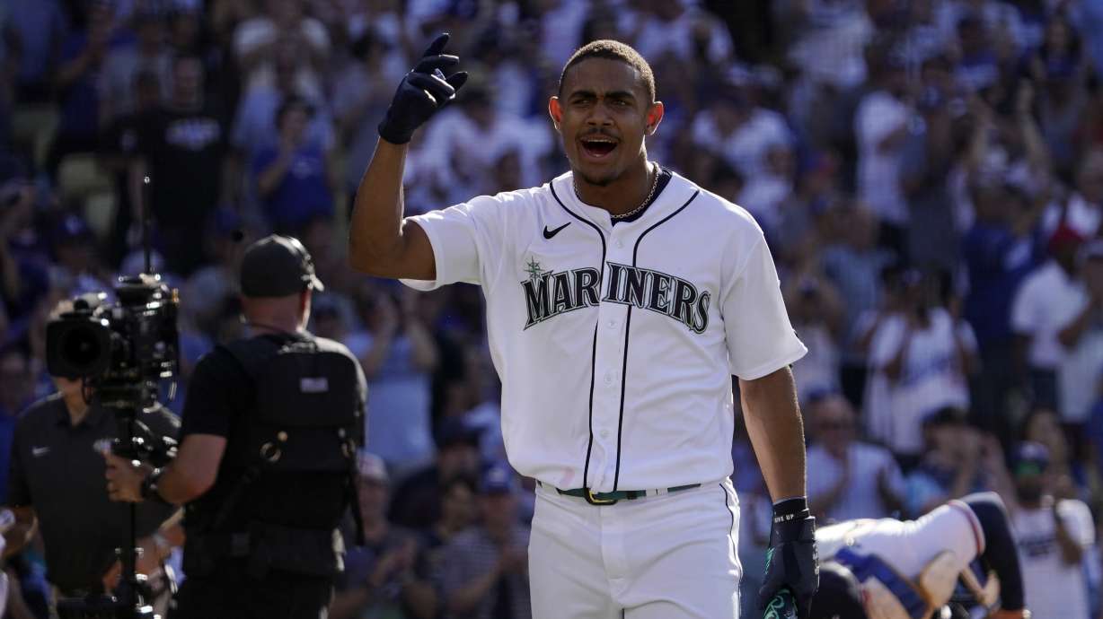 American League's Julio Rodriguez, of the Seattle Mariners, reacts during the MLB All-Star baseball Home Run Derby, Monday, July 18, 2022, in Los Angeles.