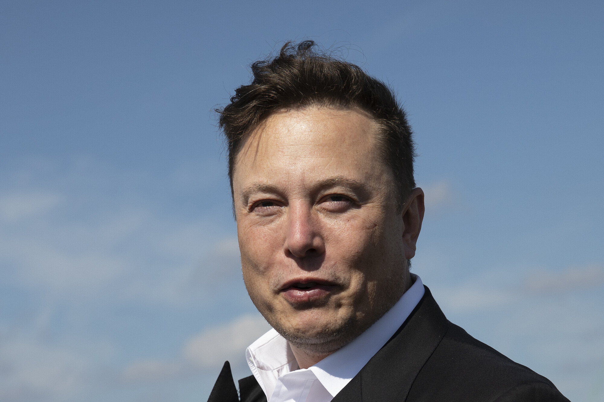 Tesla head Elon Musk arrives to look at the construction site of the new Tesla Gigafactory near Berlin on Sept. 03, 2020, near Gruenheide, Germany. Lawyers for Twitter and Musk will have their first chance to square off in court on Tuesday.