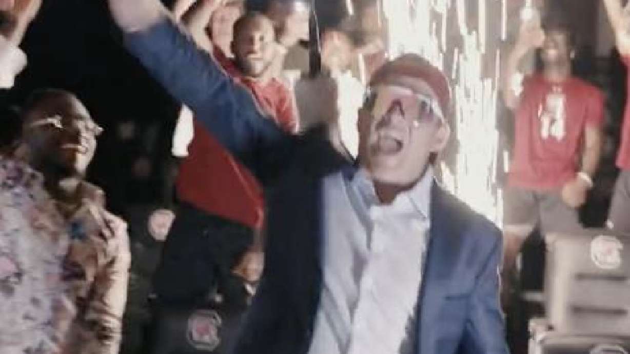 South Carolina football head coach Shane Beamer dances as part of a football hype video.