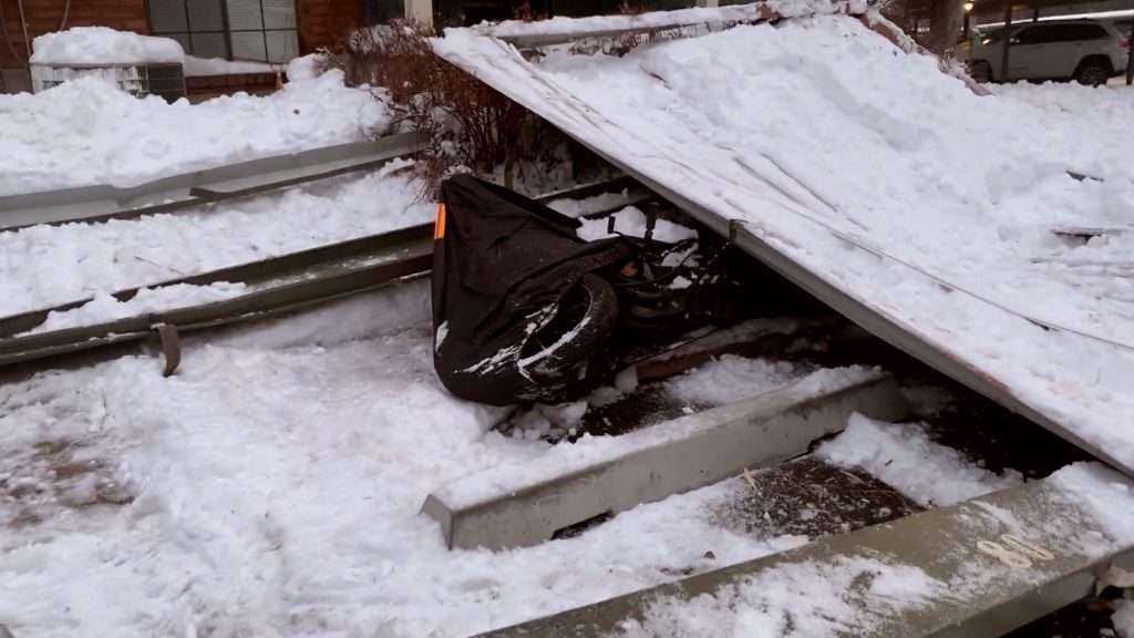 The Shraders' motorcycle was crushed in December 2021, along with several other cars, when the carport collapsed.
