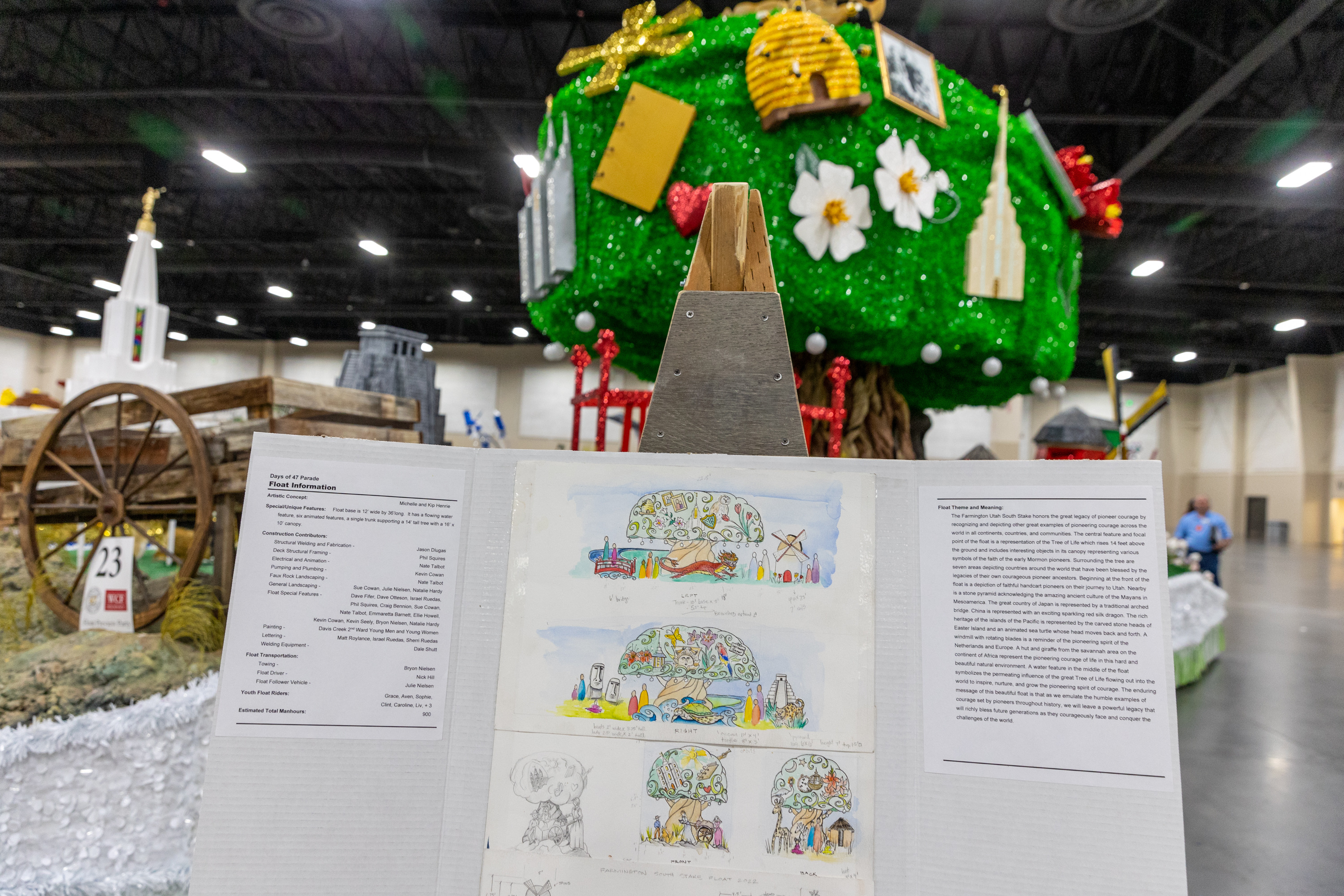 Plans for Farmington Utah South Stake float are displayed in front of the float at the Days of ’47 Float Preview Party inside of the Mountain America Expo Center in Sandy on Monday. The parade and a marathon Saturday are expected to result in some road closures in the city.