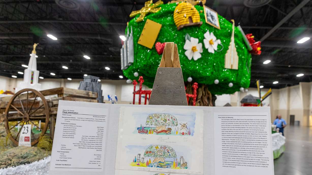 Plans for Farmington Utah South Stake float are displayed in front of the float at the Days of ’47 Float Preview Party inside of the Mountain America Expo Center in Sandy on Monday. The parade and a marathon Saturday are expected to result in some road closures in the city.