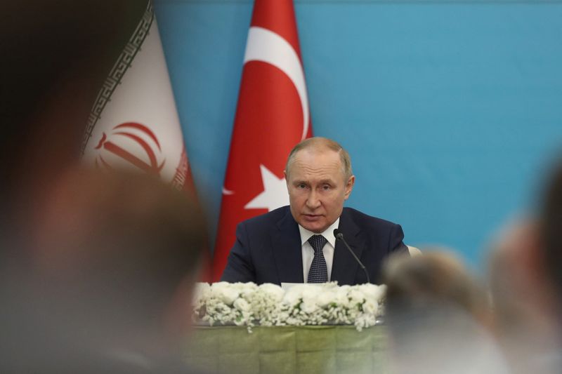 Russian President Vladimir Putin attends a news conference following the Astana Process summit in Tehran, Iran on Tuesday. Putin said Moscow did not see any desire from Ukraine to fulfill the terms of what he described as a preliminary peace deal agreed to in March.