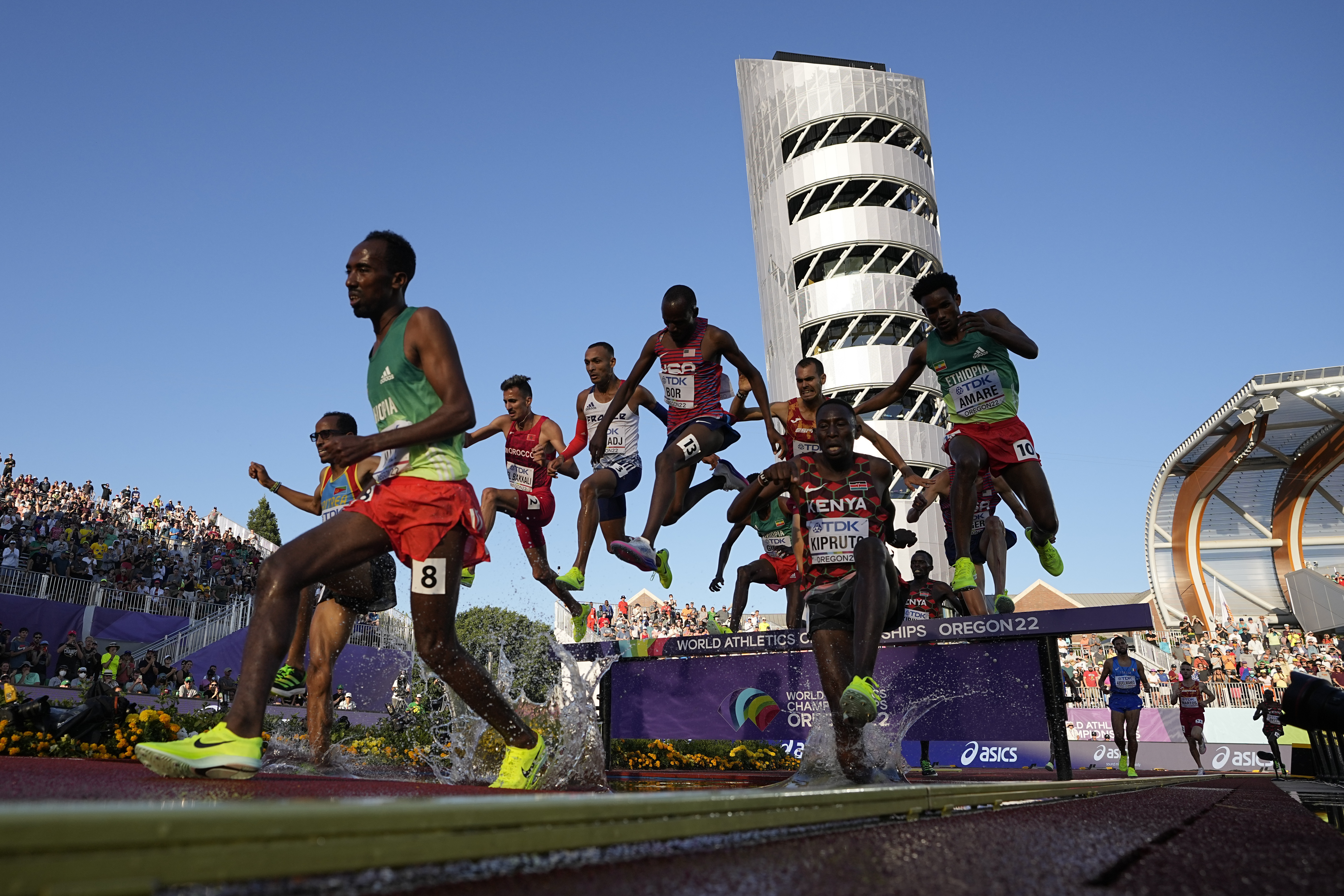 Runners compete during the men's 3000-meter steeplechase final at the World Athletics Championships on Monday, July 18, 2022, in Eugene, Ore. 