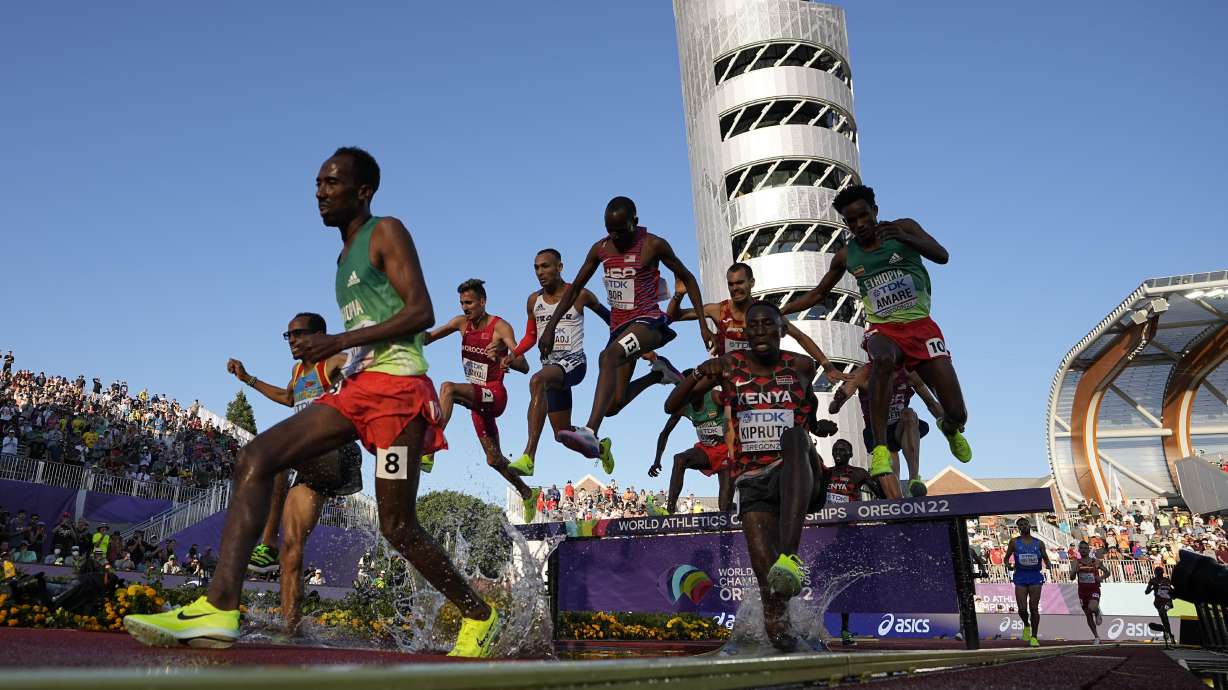 Runners compete during the men's 3000-meter steeplechase final at the World Athletics Championships on Monday, July 18, 2022, in Eugene, Ore.