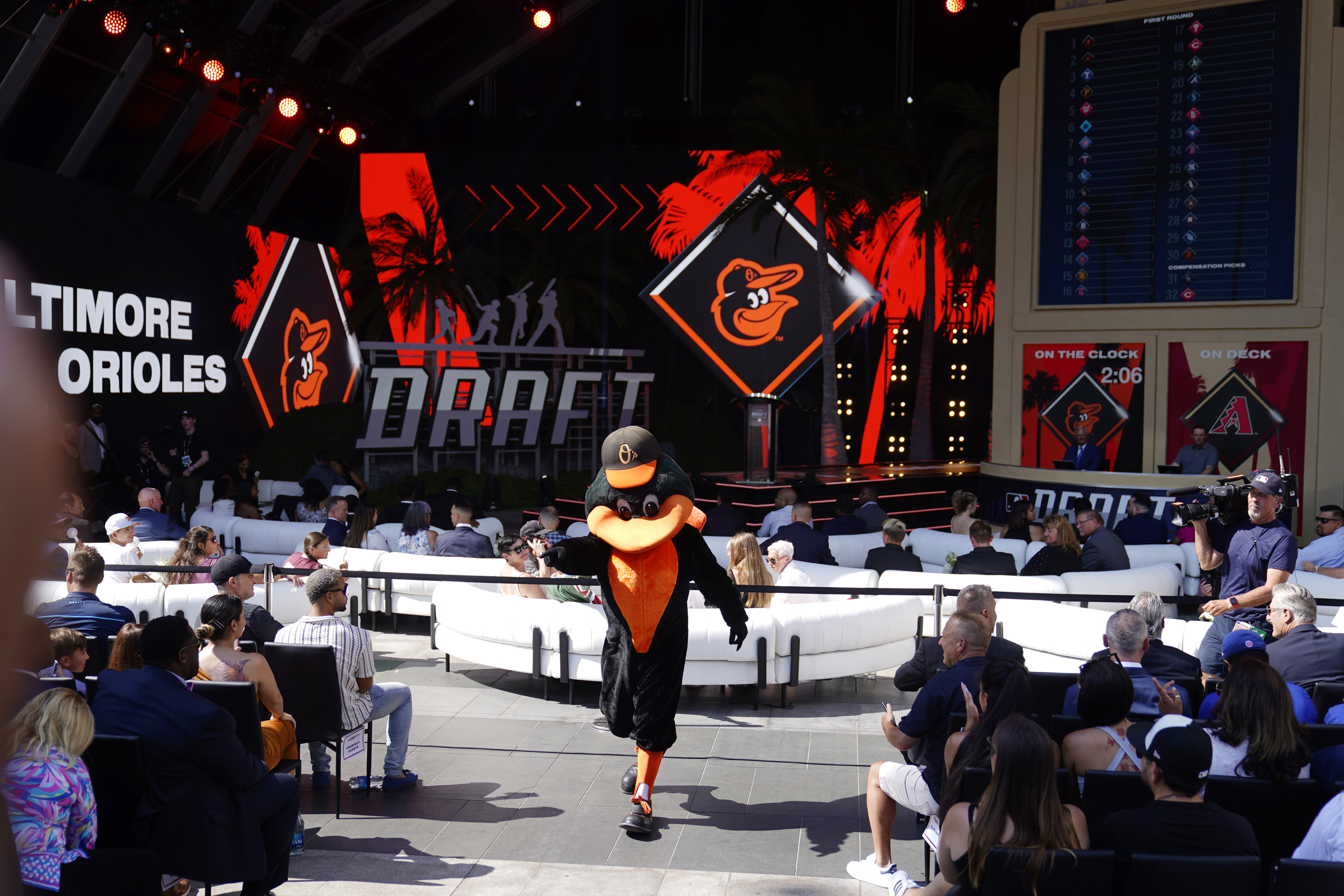 The Baltimore Orioles mascot greets fans during the 2022 MLB baseball draft, Sunday, July 17, 2022, in Los Angeles. 