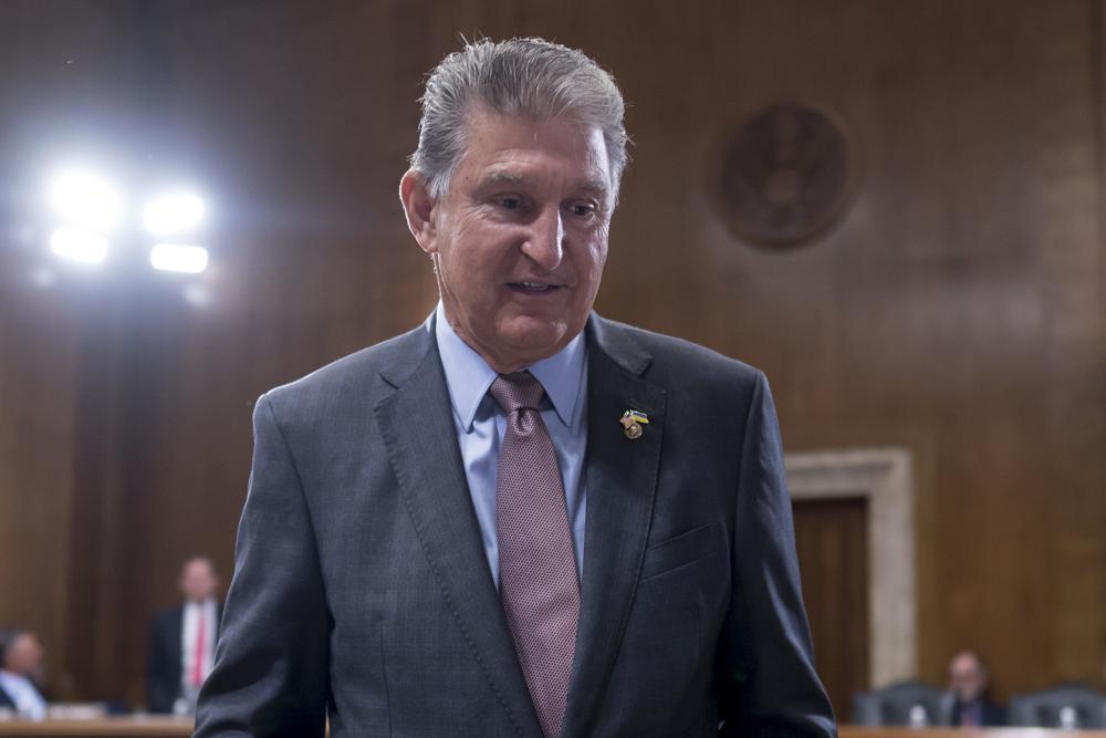 Sen. Joe Manchin, D-W.Va., arrives to chair the Senate Committee on Energy and Natural Resources, at the Capitol in Washington, on Tuesday. A bipartisan group of senators, including Manchin, on Wednesday released proposed changes, to the Electoral Count Act, the post-Civil War-era law for certifying presidential elections that came under intense scrutiny after the Jan. 6 attack on the Capitol and Donald Trump's effort to overturn the 2020 election.