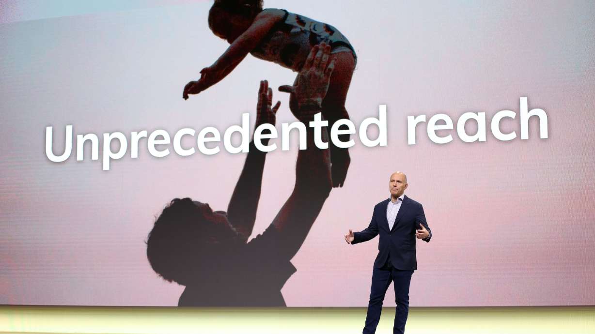 Expedia Group CEO Peter Kern on stage at EXPLORE 22 on May 4 in Las Vegas. While average workers saw the value of their earnings shrink in 2021, CEO salaries rose, according to a new study.