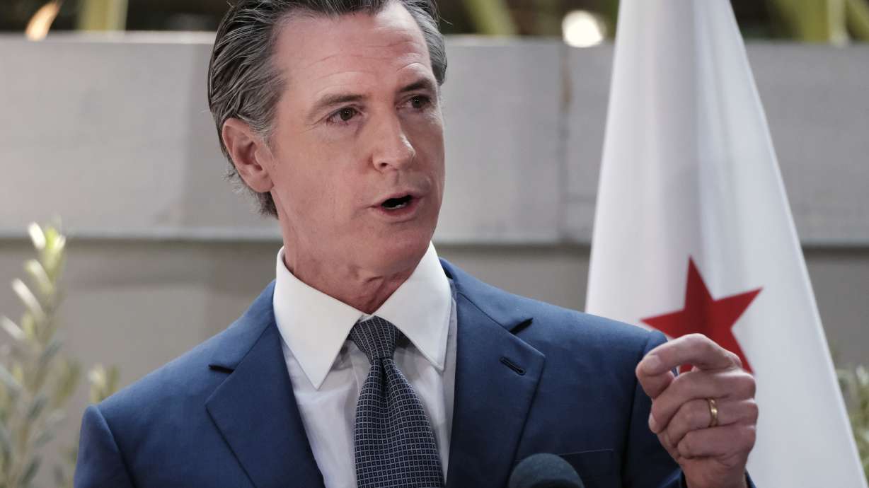 FILE - California Governor Gavin Newsom answers questions at a news conference in Los Angeles, on June 9, 2022. As President Joe Biden runs up against the limits of what he can do on abortion, gun control and other issues without larger Democratic majorities in Congress, some in his party want more fire and boldness than the president's acknowledgement of their frustration and calls imploring people to vote in November.