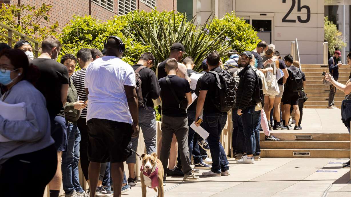 People stand in long lines to receive the monkeypox vaccine at San Francisco General Hospital in San Francisco, July 12.