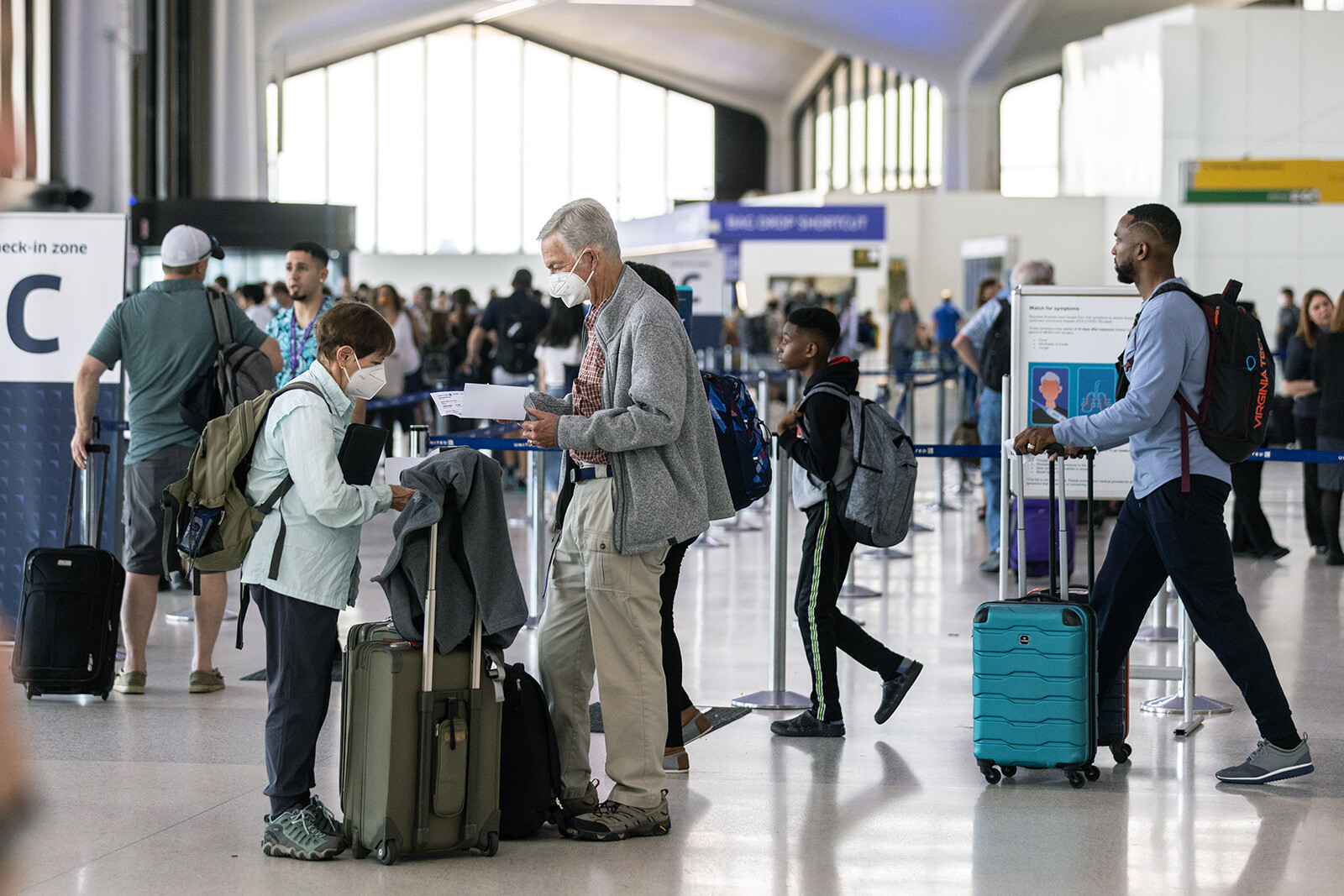 Travelers line up to check in at Newark Liberty International Airport on July 1. Newark is the world's No. 2 airport for cancellations this summer.