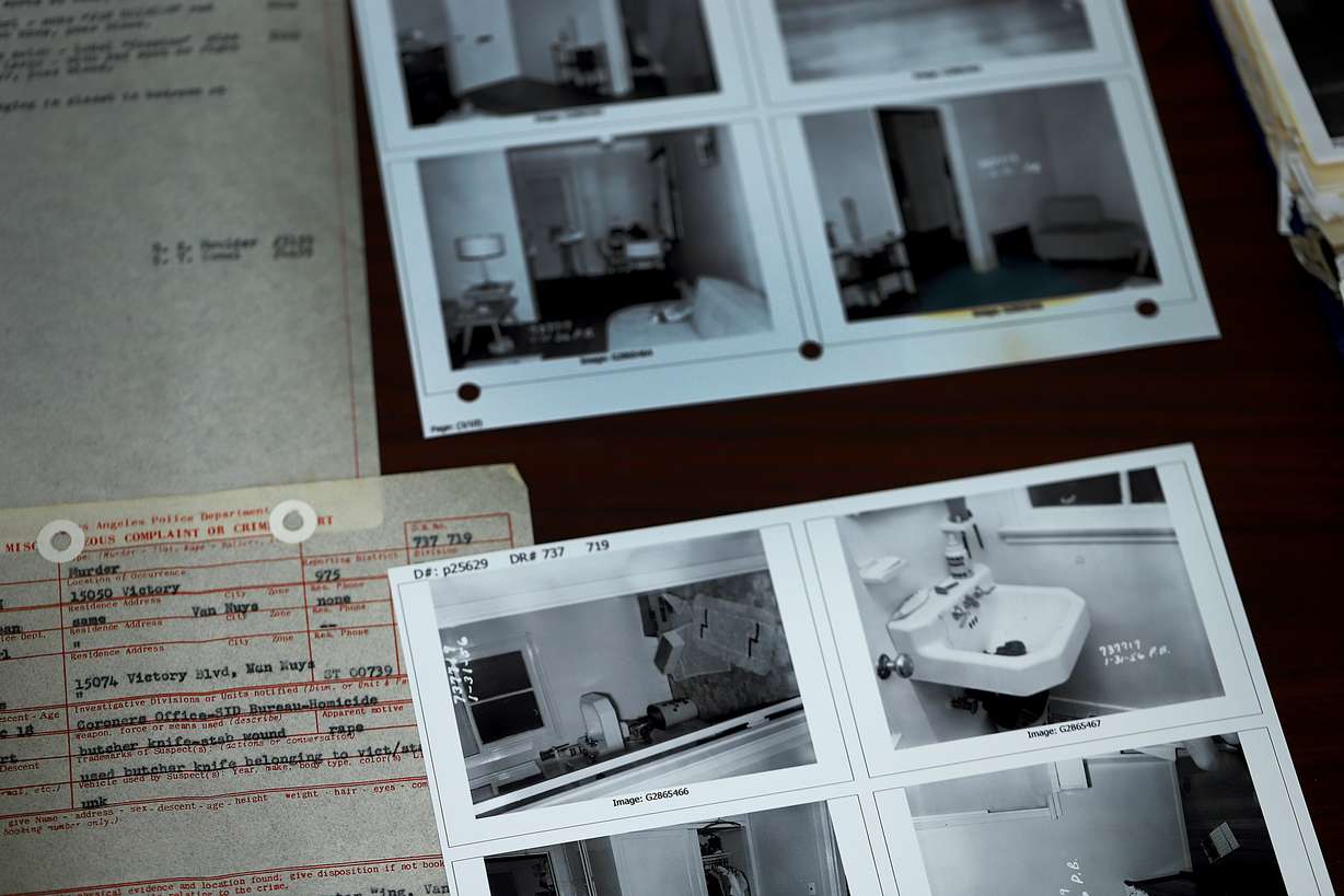 Evidence photos and reports of a 1956 murder scene where Barbara Jepson and her unborn child were killed in a brutal stabbing are pictured on June 2, in Los Angeles.