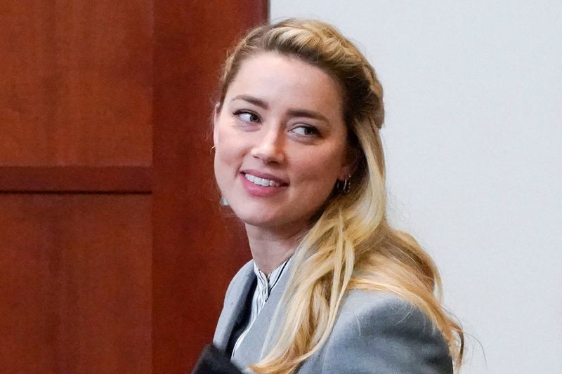 Actor Amber Heard leaves during a break in the courtroom during closing arguments during her ex-husband Johnny Depp's defamation case against her at the Fairfax County Circuit Courthouse in Fairfax, Virginia, May 27.