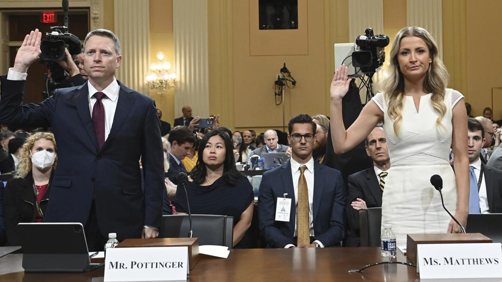 Matt Pottinger, former deputy national security adviser, and Sarah Matthews, former White House deputy press secretary, are sworn in as the House select committee investigating the Jan. 6 attack on the U.S. Capitol holds a hearing at the Capitol in Washington, Thursday.