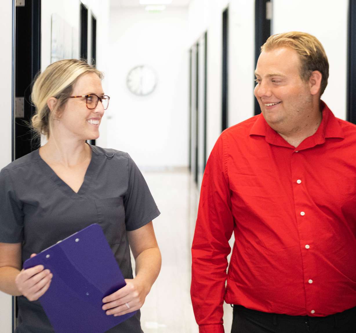 A Serenity staff member with patient Jake Henseler.