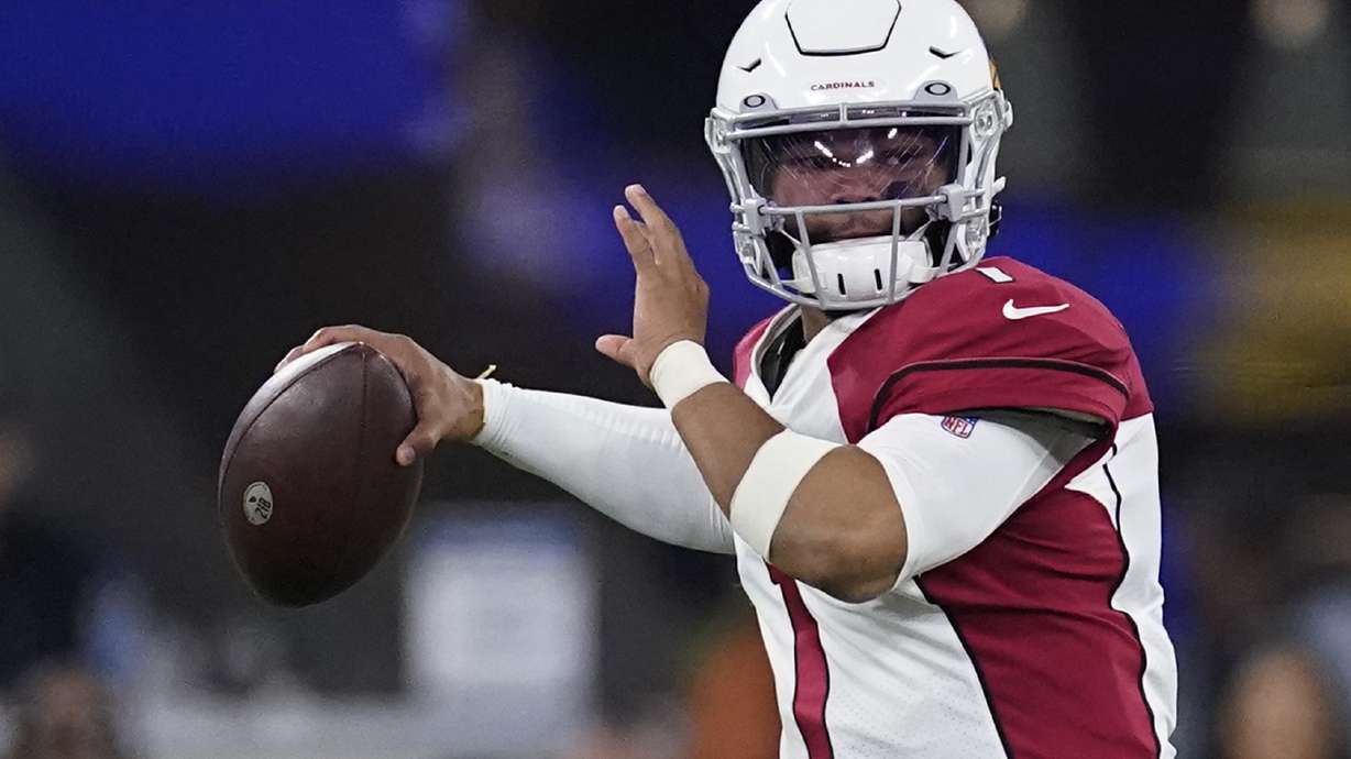 FILE - Arizona Cardinals quarterback Kyler Murray (1) passes against the Los Angeles Rams during the second half of an NFL wild-card playoff football game in Inglewood, Calif., Monday, Jan. 17, 2022. Kyler Murray has agreed to a long-term contract that will keep the quarterback with the Arizona Cardinals through the 2028 season.