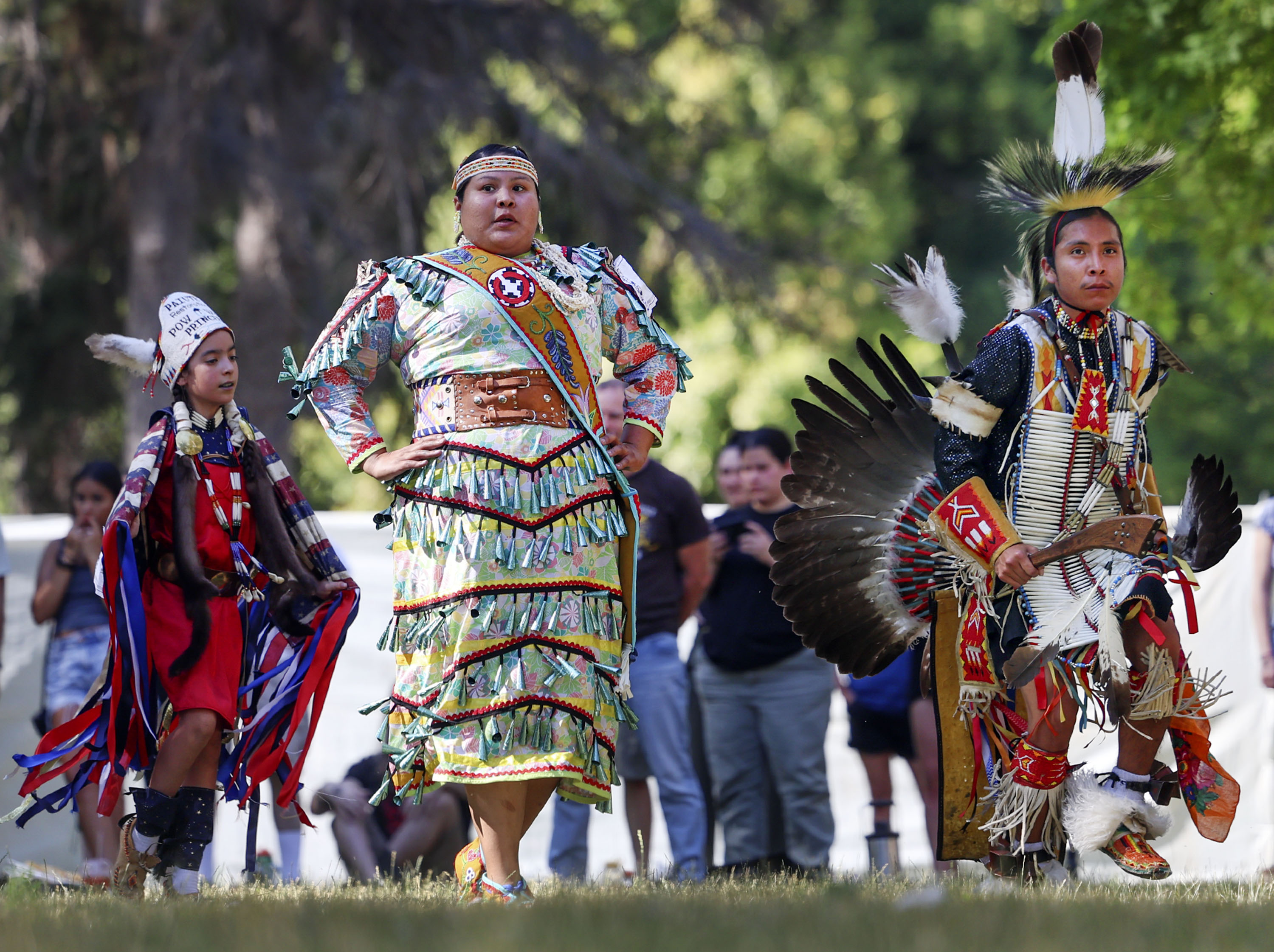 Dancers participate in the grand entry during the 28th Annual Intertribal Powwow in Liberty Park in Salt Lake City on Saturday.