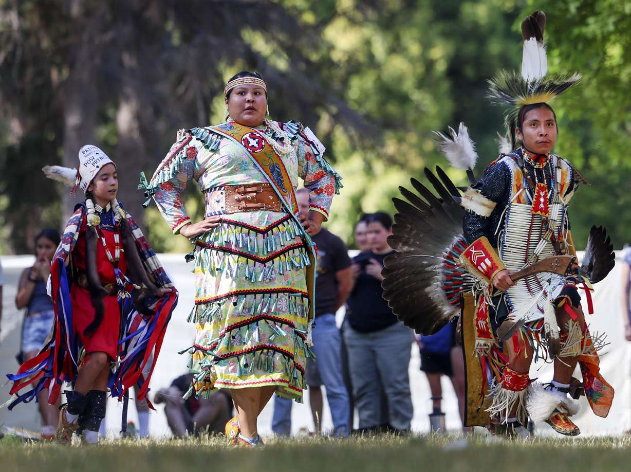 Dancers participate in the grand entry during the 28th Annual Intertribal Powwow in Liberty Park in Salt Lake City on Saturday.