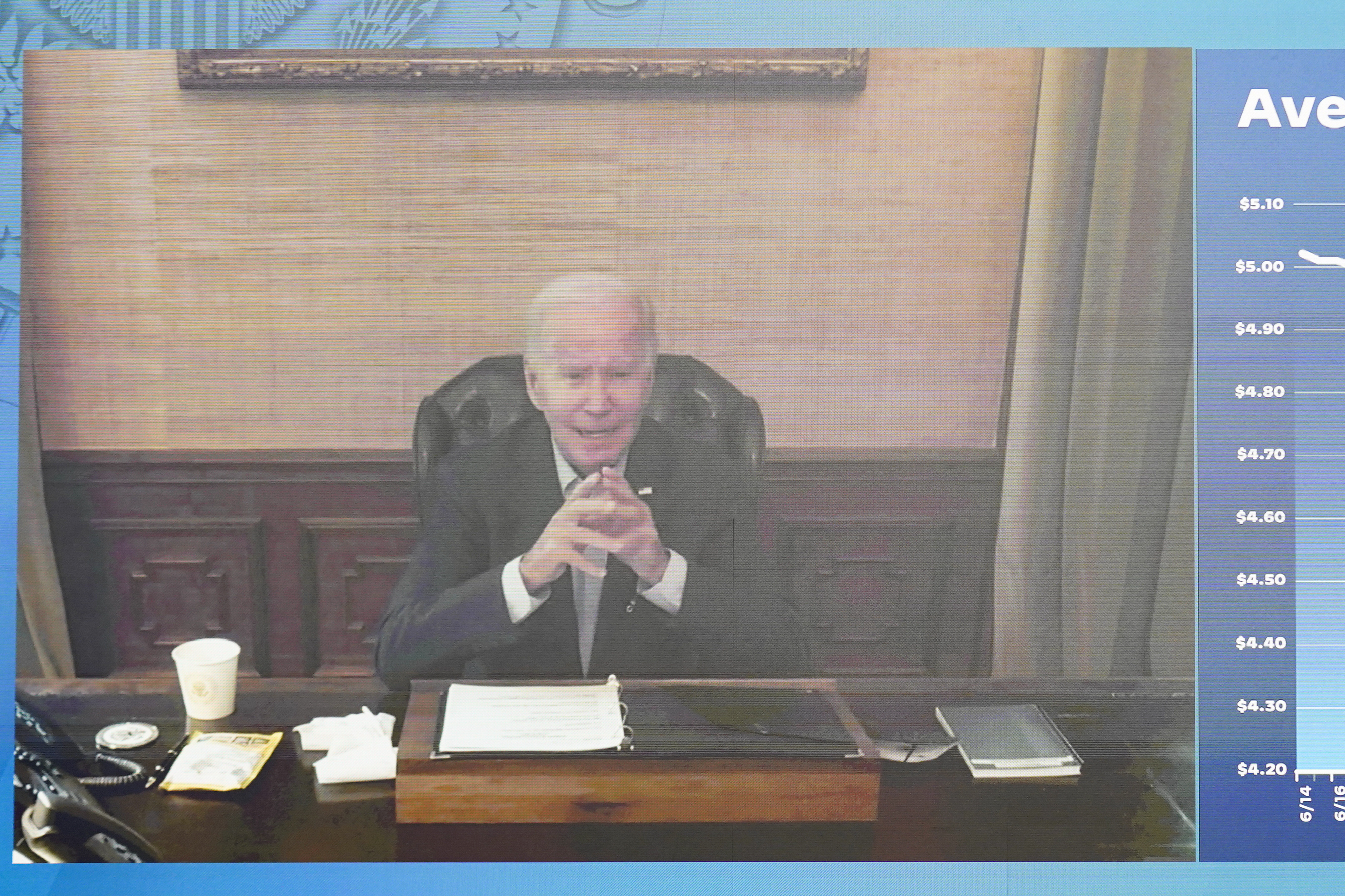 President Joe Biden speaks virtually during a meeting with his economic team on the White House complex in Washington, Friday. The White House COVID-19 coordinator said Sunday Biden is feeling "much, much better" after testing positive for the coronavirus.