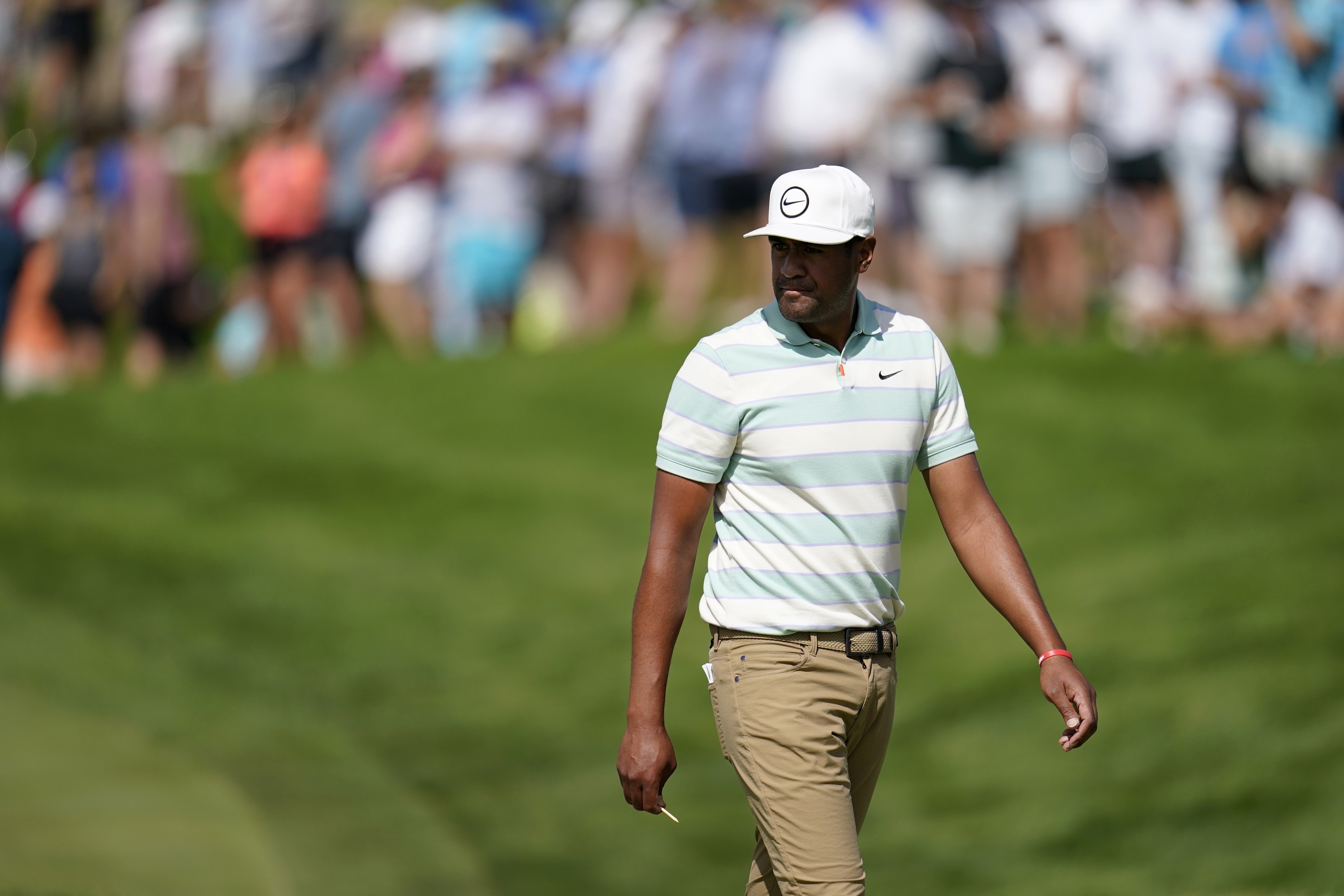Tony Finau walks onto the 16th green during the final round of the 3M Open golf tournament at the Tournament Players Club in Blaine, Minn., Sunday, July 24, 2022. 